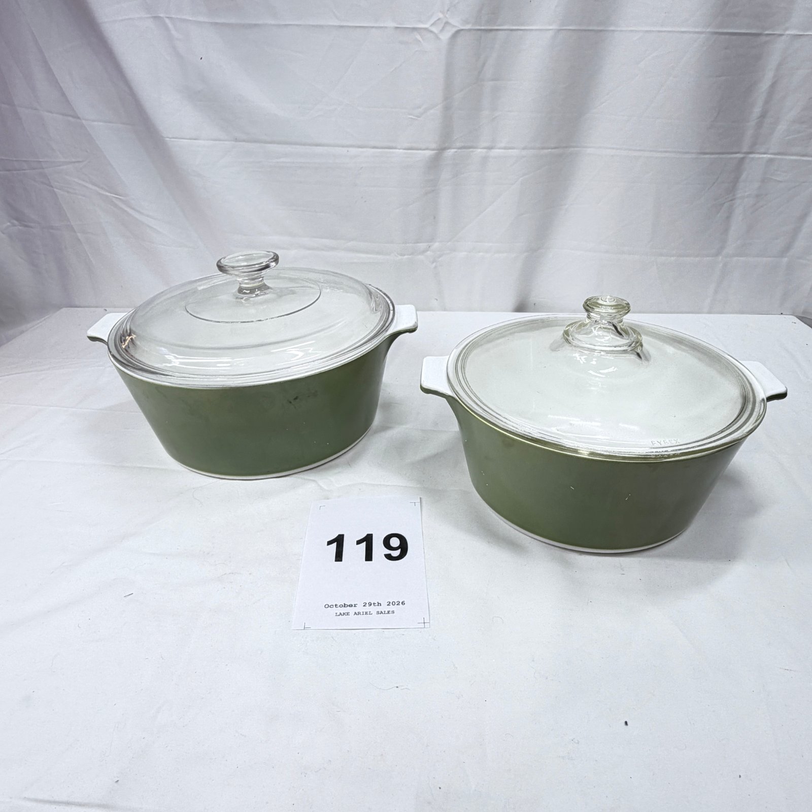 Lot 119: 1970s Pyrex "Avocado Green" covered casserole dishes with lids, set of 2