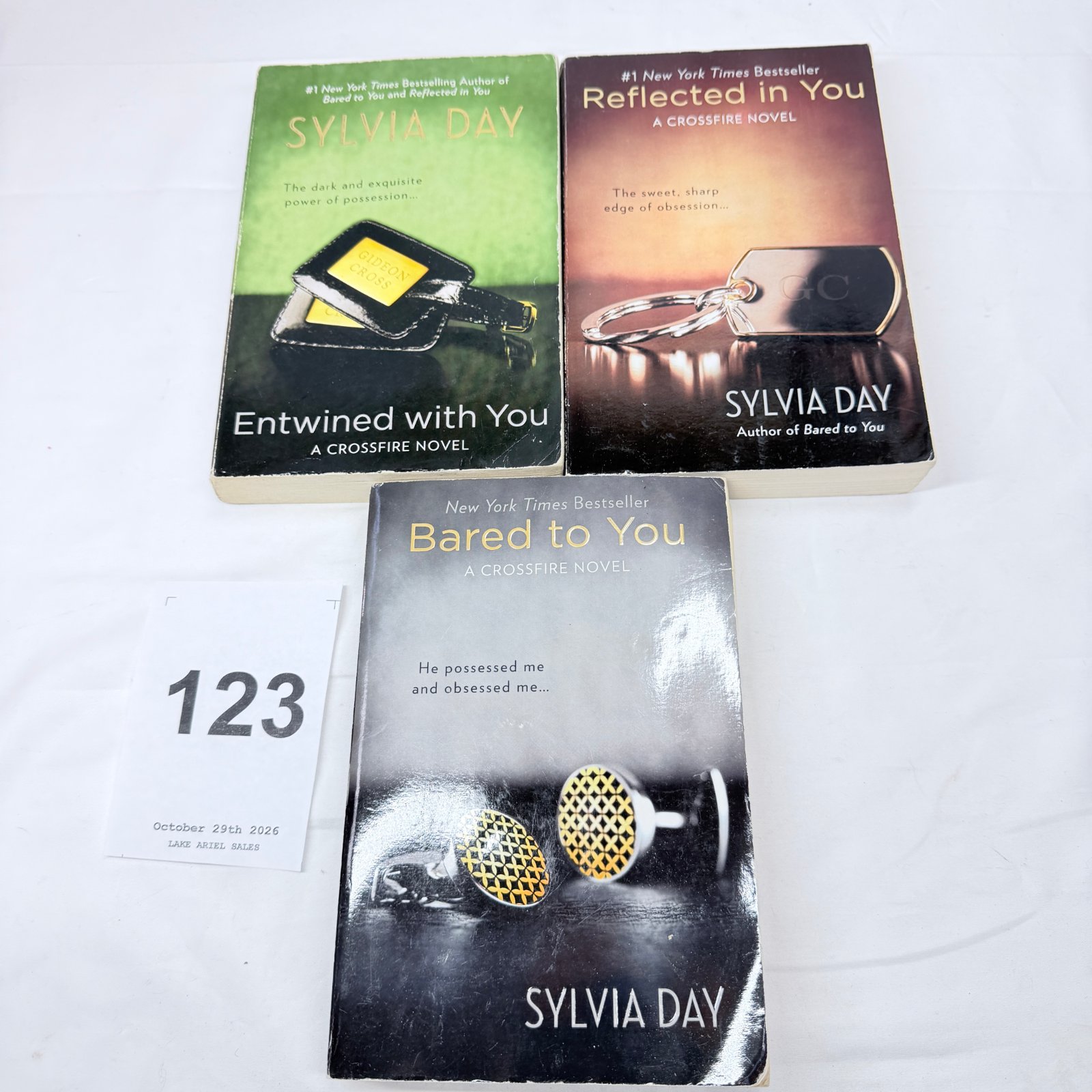 Lot 123: Sylvia Day "Crossfire" series paperback novels, Bared to You/Reflected in You/Entwined with You, set of 3