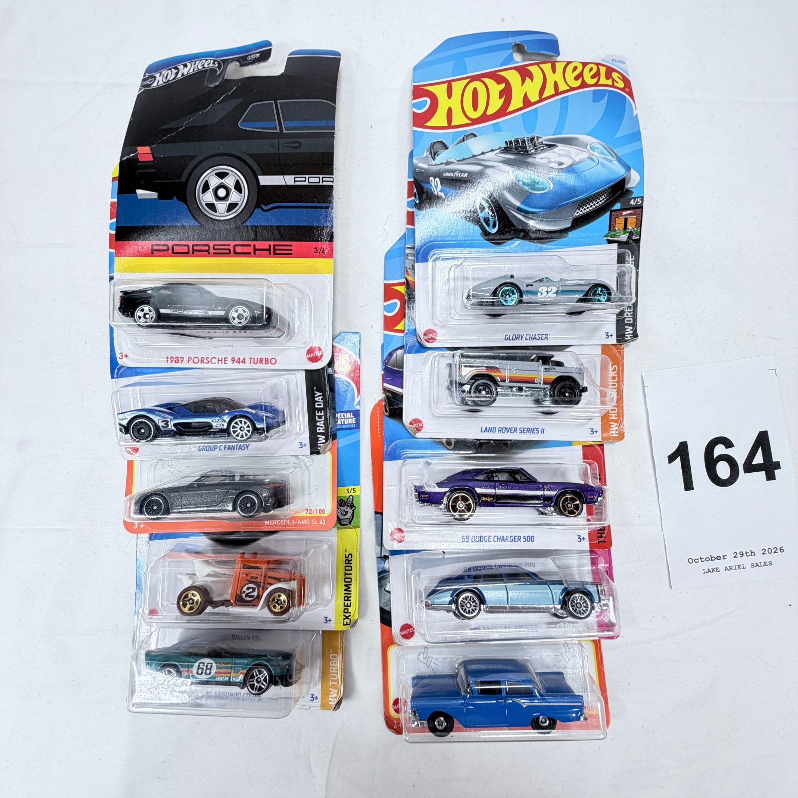 Lot 164: Hot Wheels carded die-cast car lot of 10, incl. 1989 Porsche 944 Turbo, '69 Dodge Charger 500, Glory Chaser, Land Rover Series II