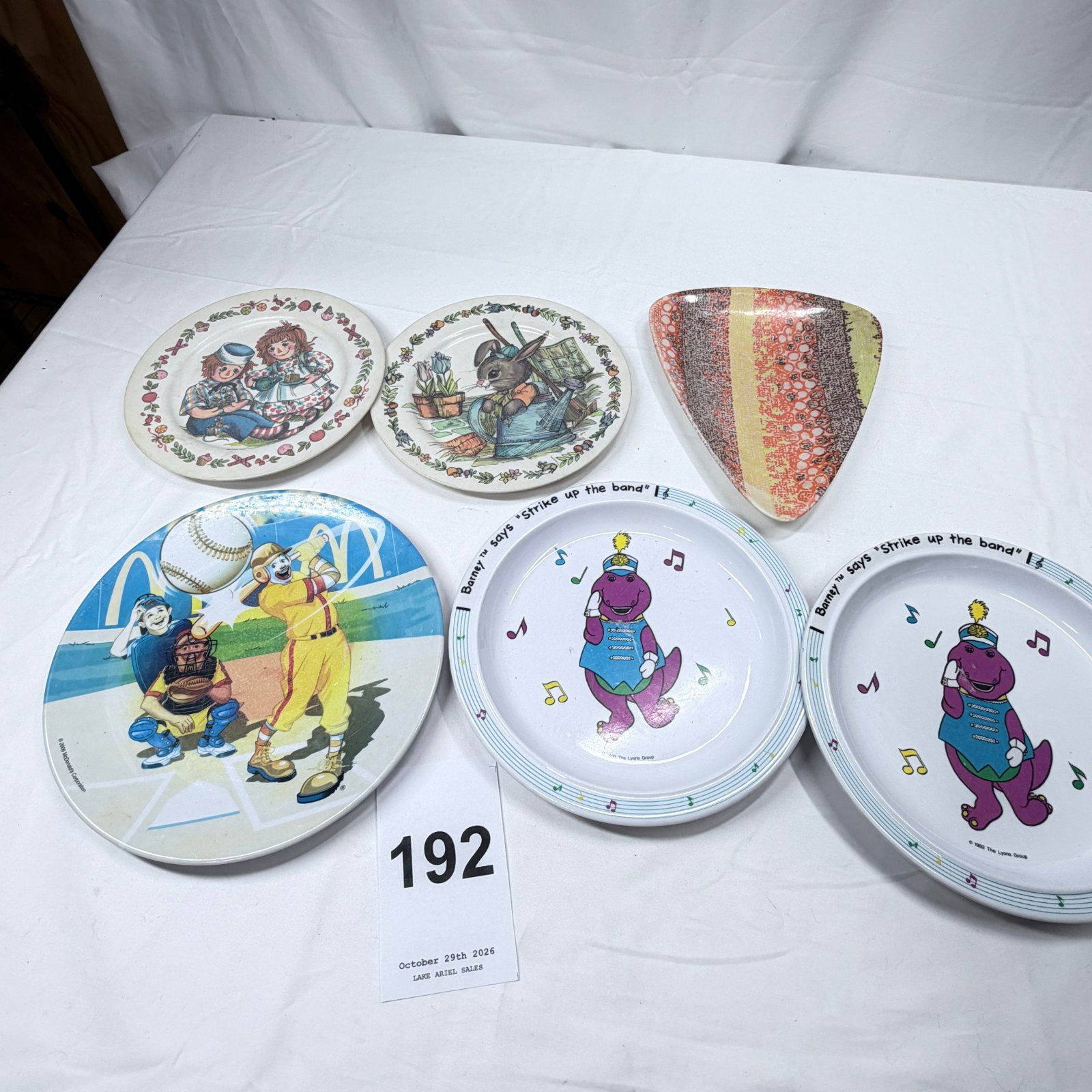 Lot 192: 1992-2008 Mixed Melamine Plate Lot: Barney "Strike Up the Band", McDonald's Baseball, Raggedy Ann & Bunny, 6 pieces