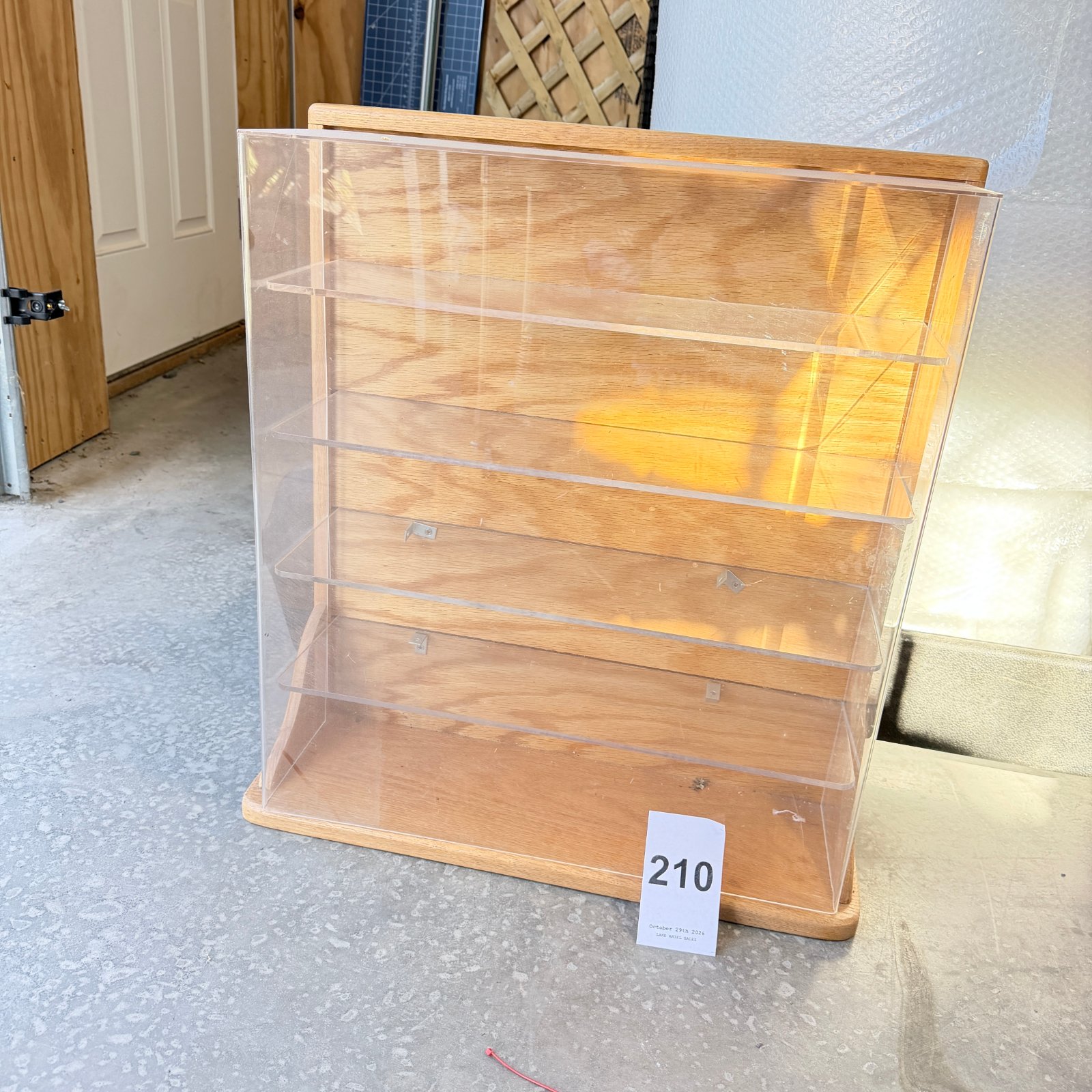 Lot 210: Wood and acrylic countertop display case with 4 shelves
