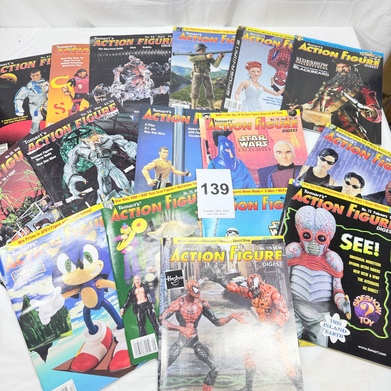 Lot 139: 1990s-2000s Tomart's Action Figure Digest magazine lot, 16 issues including Star Wars, Spider-Man & WWF covers
