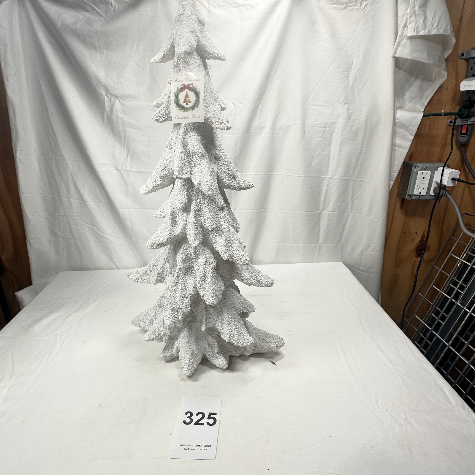 Lot 325: Textured faux snow-covered artificial Christmas tree tabletop decor, white bottlebrush-style sculpture