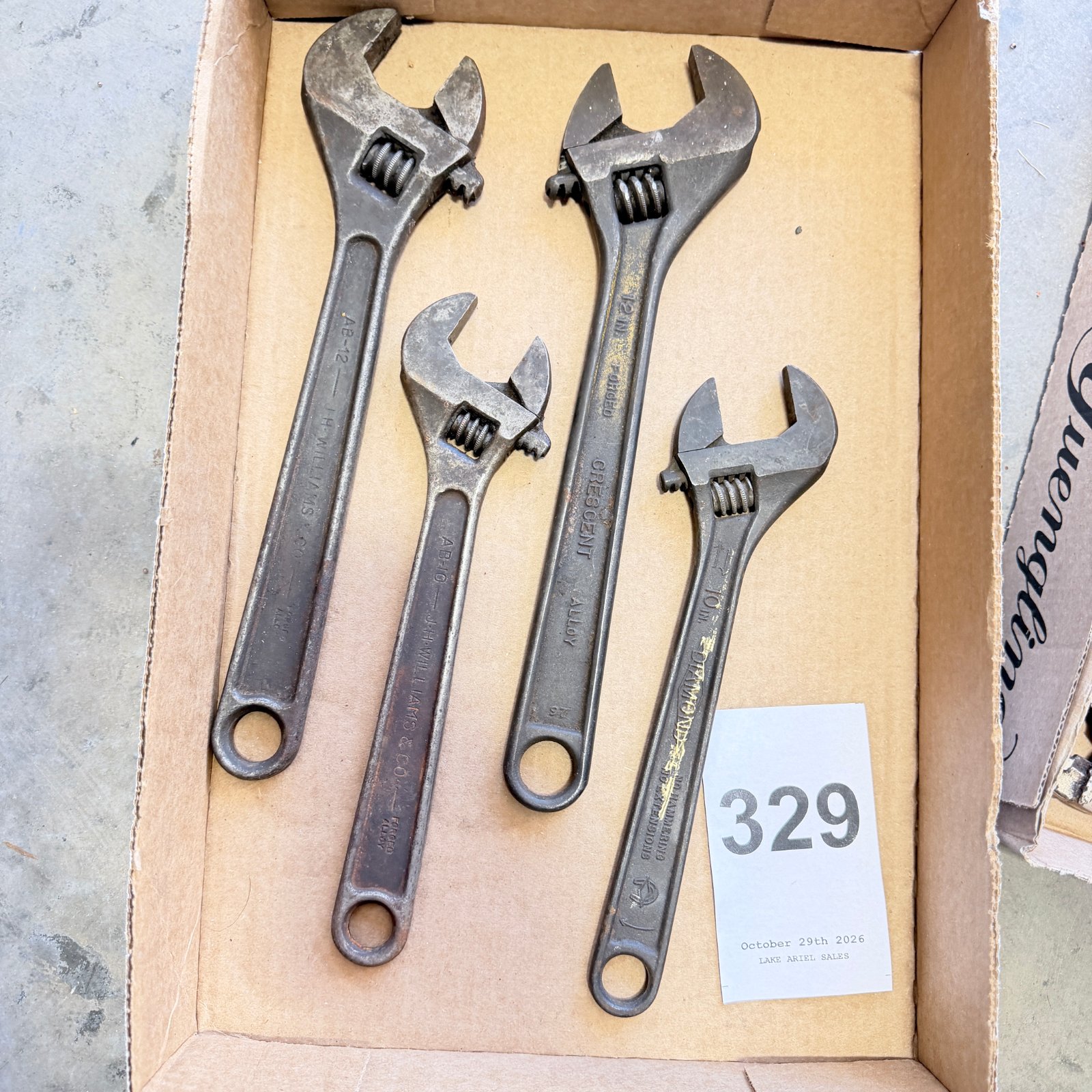 Lot 329: Mid-century adjustable wrench lot: J.H. Williams AB-12 & AB-10, Crescent Alloy 12in Forged, Diamond 10in, 4 pieces