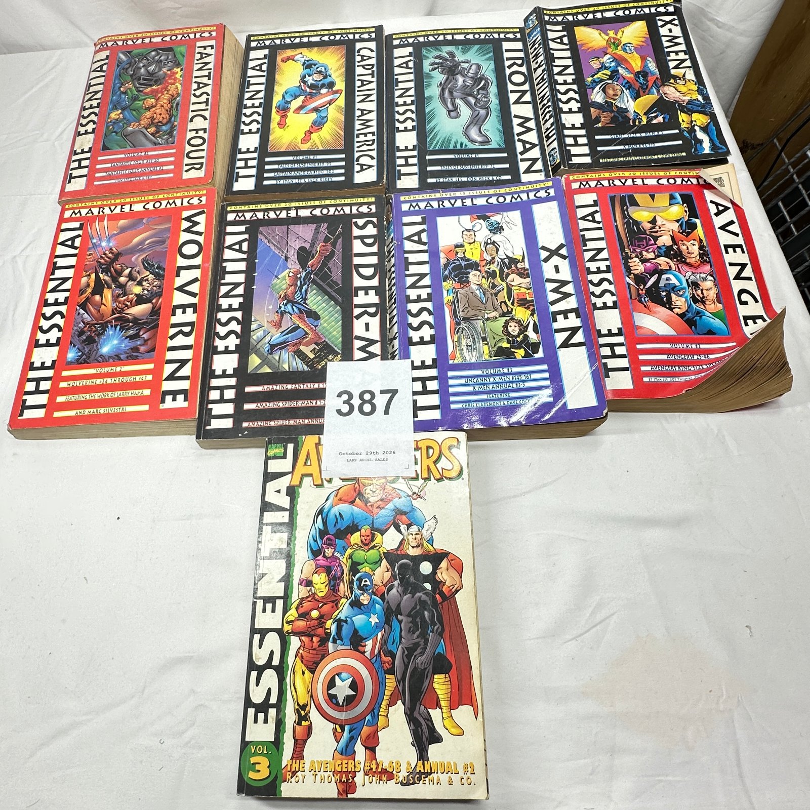 Lot 387: Marvel Comics "The Essential" TPB lot, 9 volumes - Fantastic Four, Spider-Man, X-Men, Avengers, Wolverine, Iron Man, Captain America