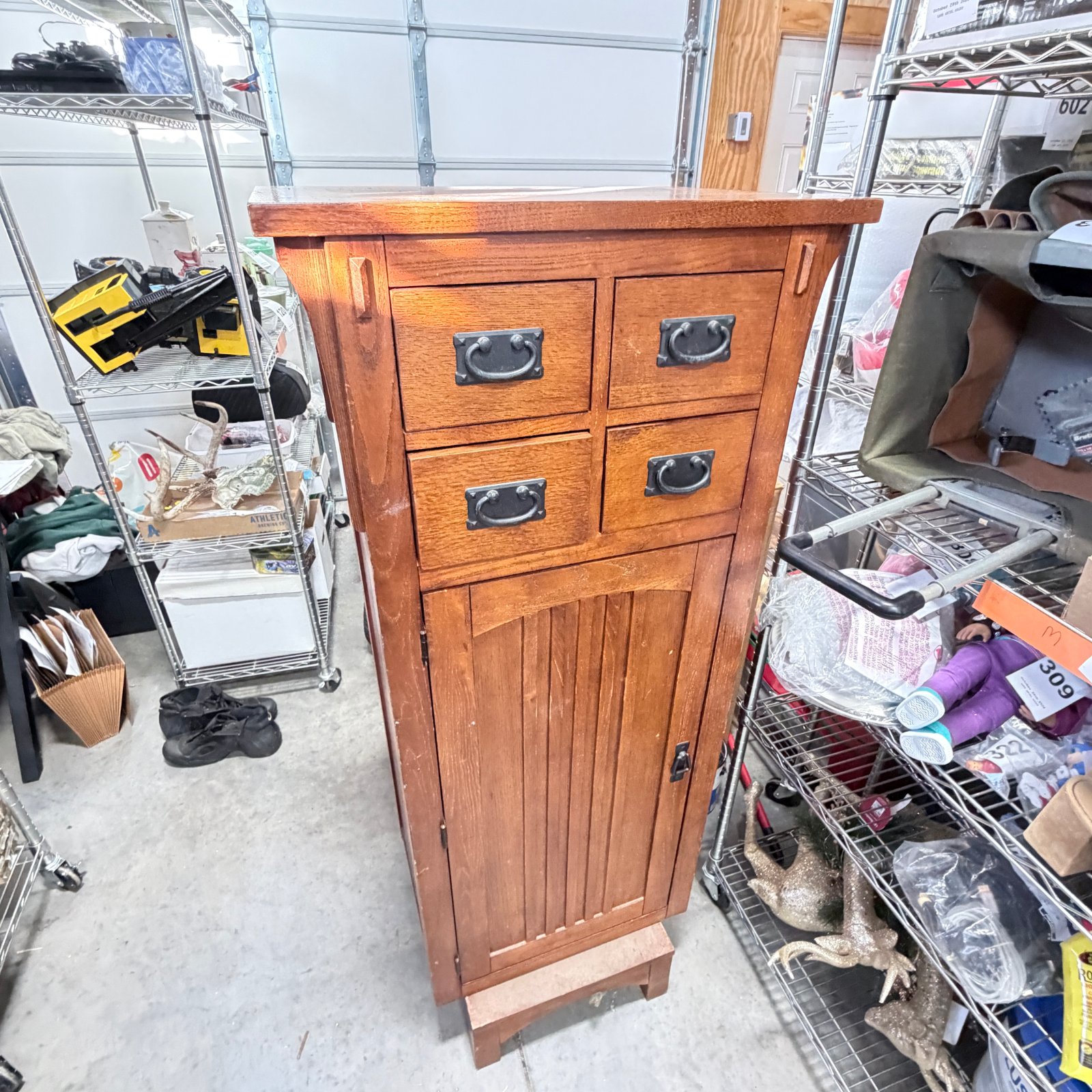 Lot 399: Mission-style oak 4-drawer jewelry armoire with mirrored cabinet door, swivel-top tall chest