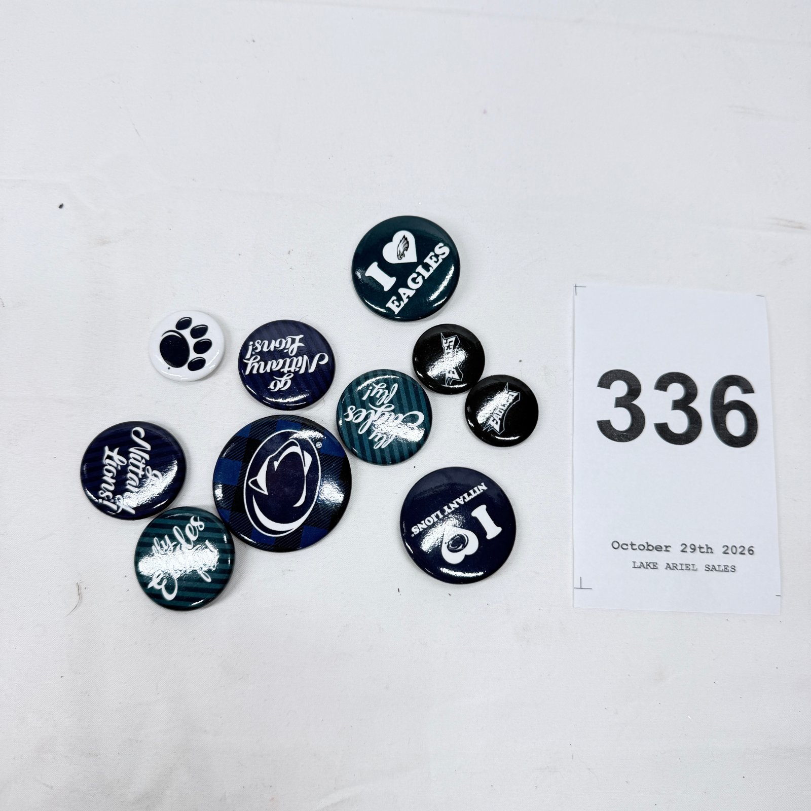 Lot 336: Philadelphia Eagles & Penn State Nittany Lions pinback button lot, 10 pieces