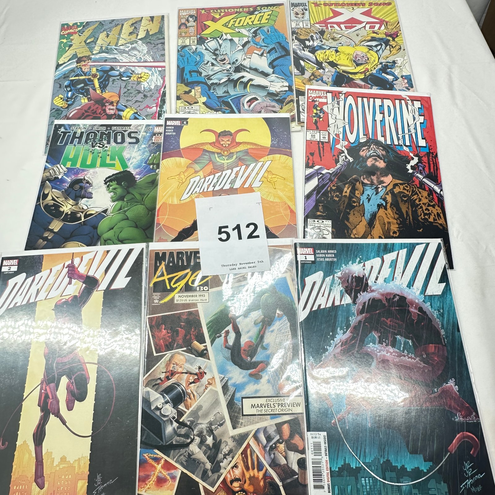 Lot 512: Marvel Comics lot (9): X-Men, X-Force, X-Factor, Wolverine #66, Thanos vs Hulk #1, Daredevil #1, #2, #6, Marvel Age #130, early 1990s-2020s issues