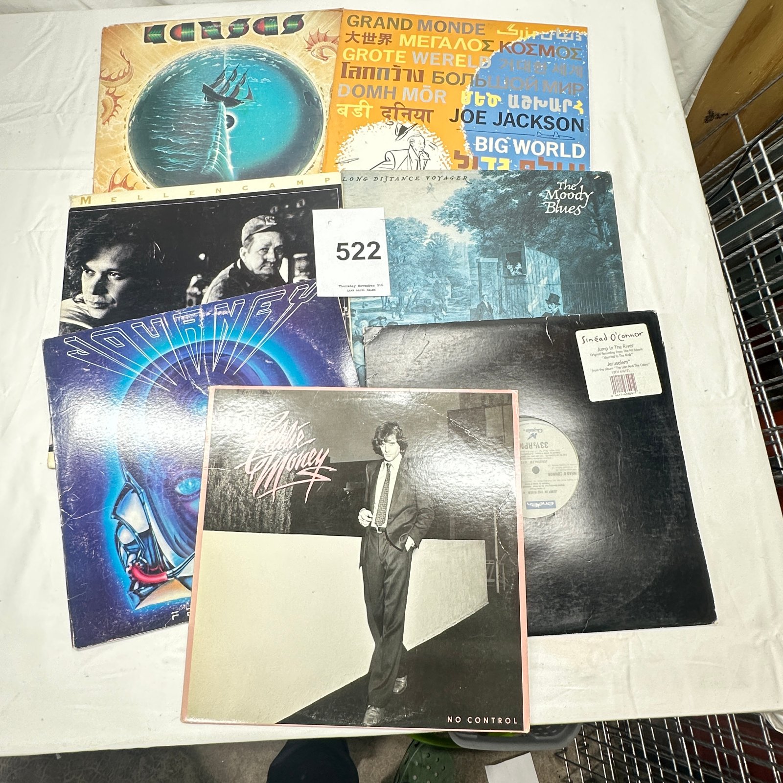 Lot 522: Classic rock/pop vinyl LP lot: Kansas, Joe Jackson "Big World," Mellencamp, Moody Blues, Journey, Eddie Money "No Control," Sinead O'Connor 12