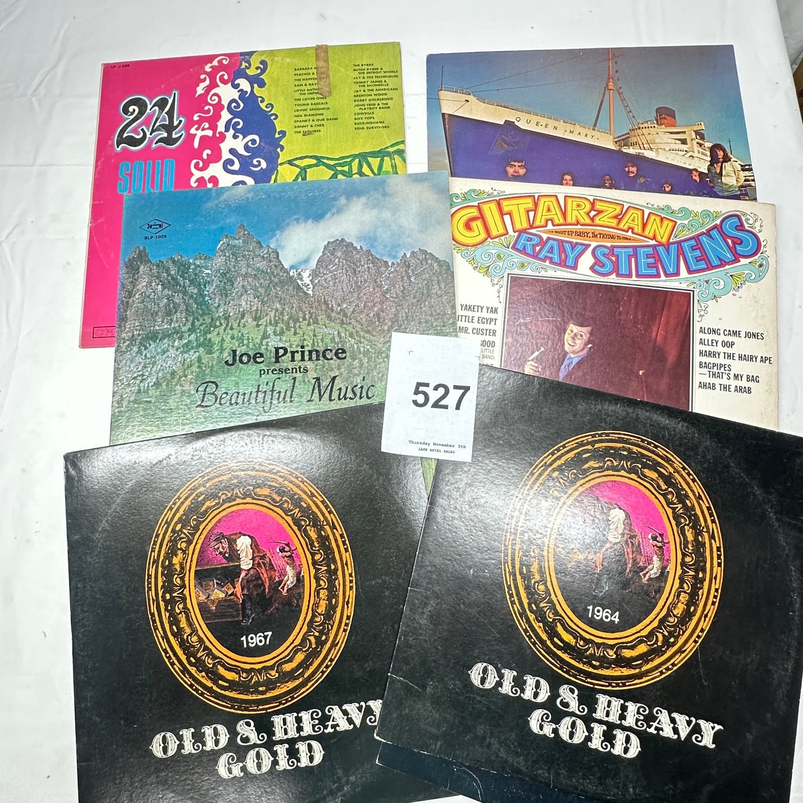 Lot 527: 1960s LP record lot: "24 Solid Gold Hits," Ray Stevens "Gitarzan," Joe Prince "Beautiful Music," Old & Heavy Gold 1964 & 1967 (6 albums)