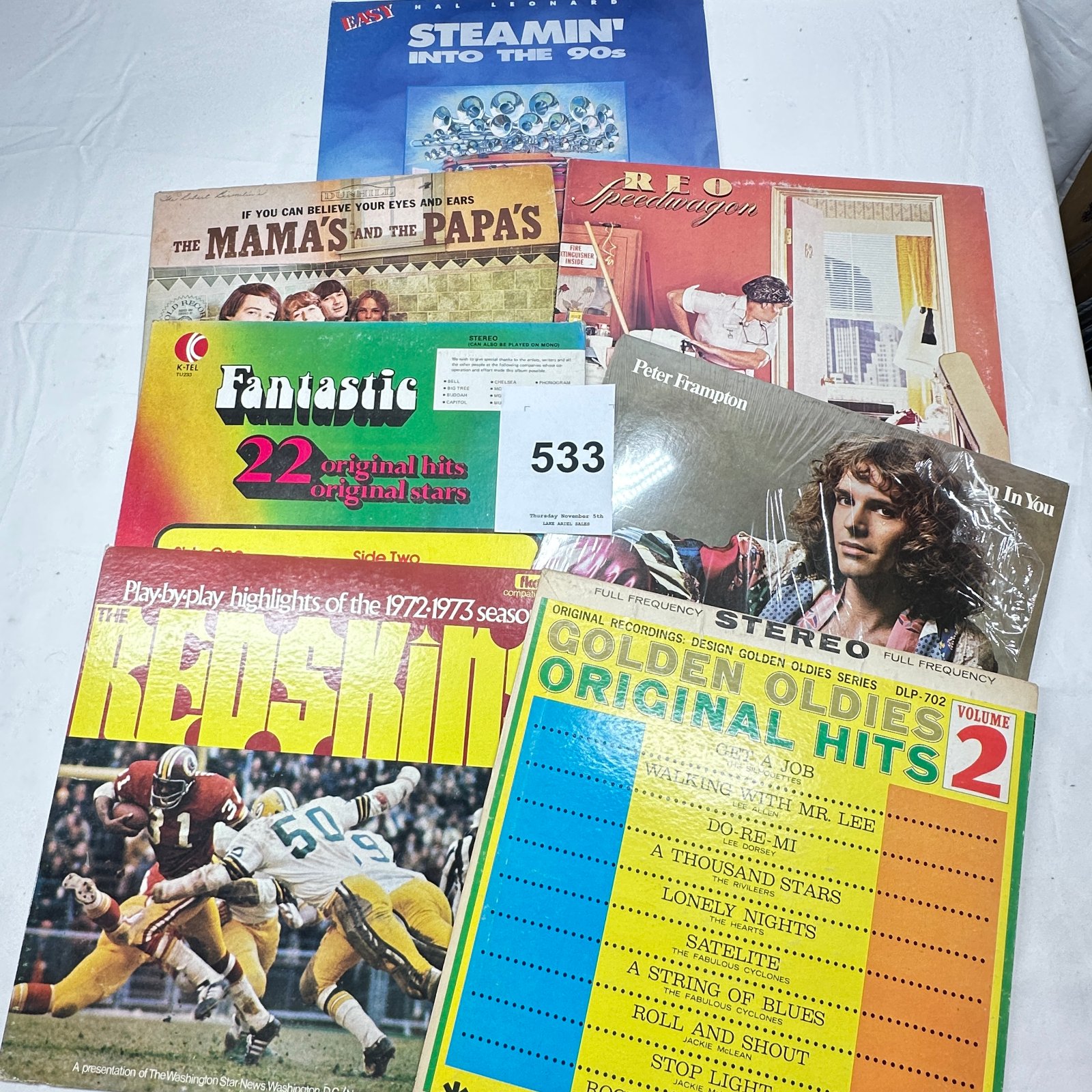Lot 533: 1970s vinyl LP lot (9): REO Speedwagon, Mamas & Papas, Peter Frampton, K-Tel Fantastic 22, Golden Oldies Vol 2, Washington Redskins 1972-73