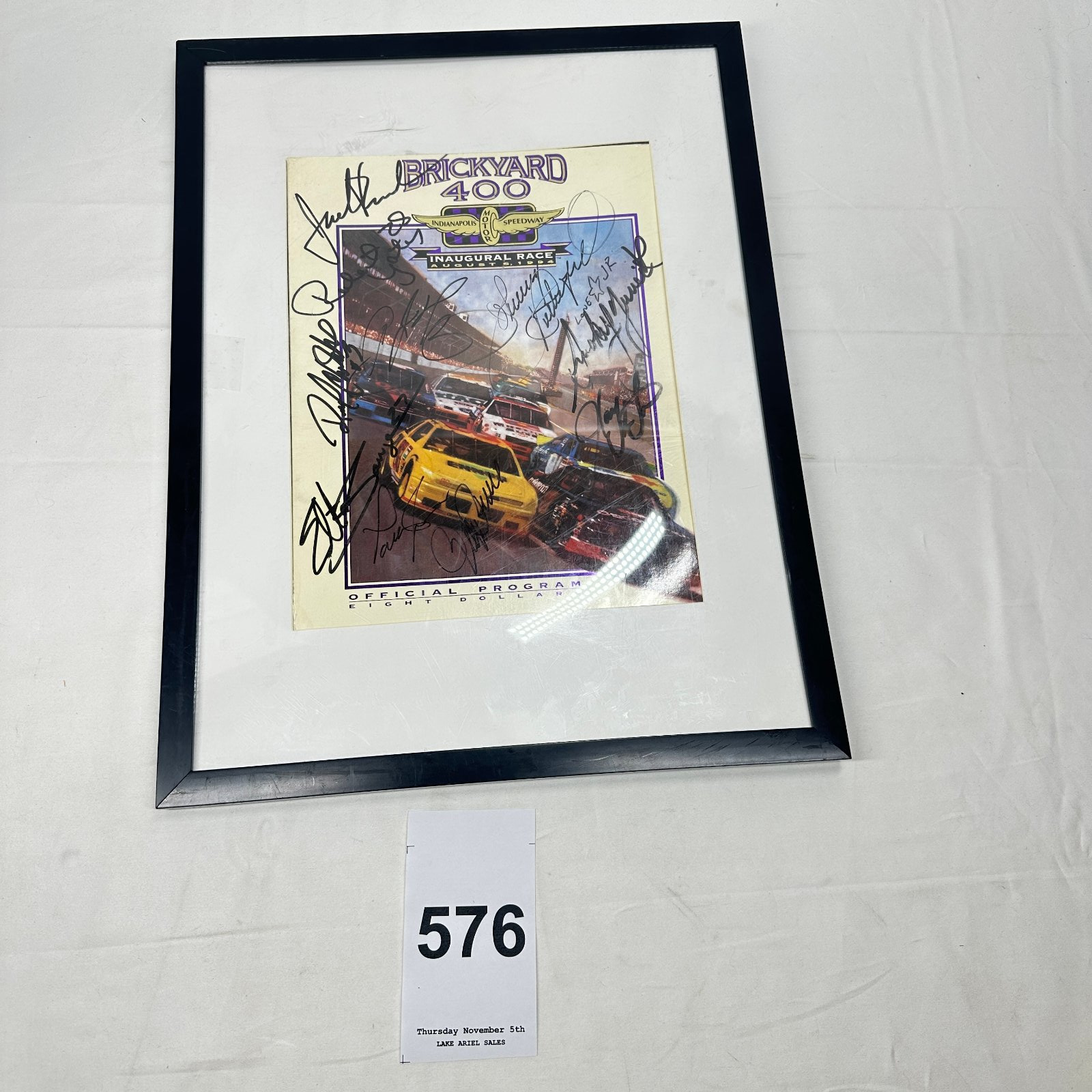 Lot 576: 1994 Indianapolis Motor Speedway Brickyard 400 Inaugural Race signed official program, framed NASCAR driver autographs