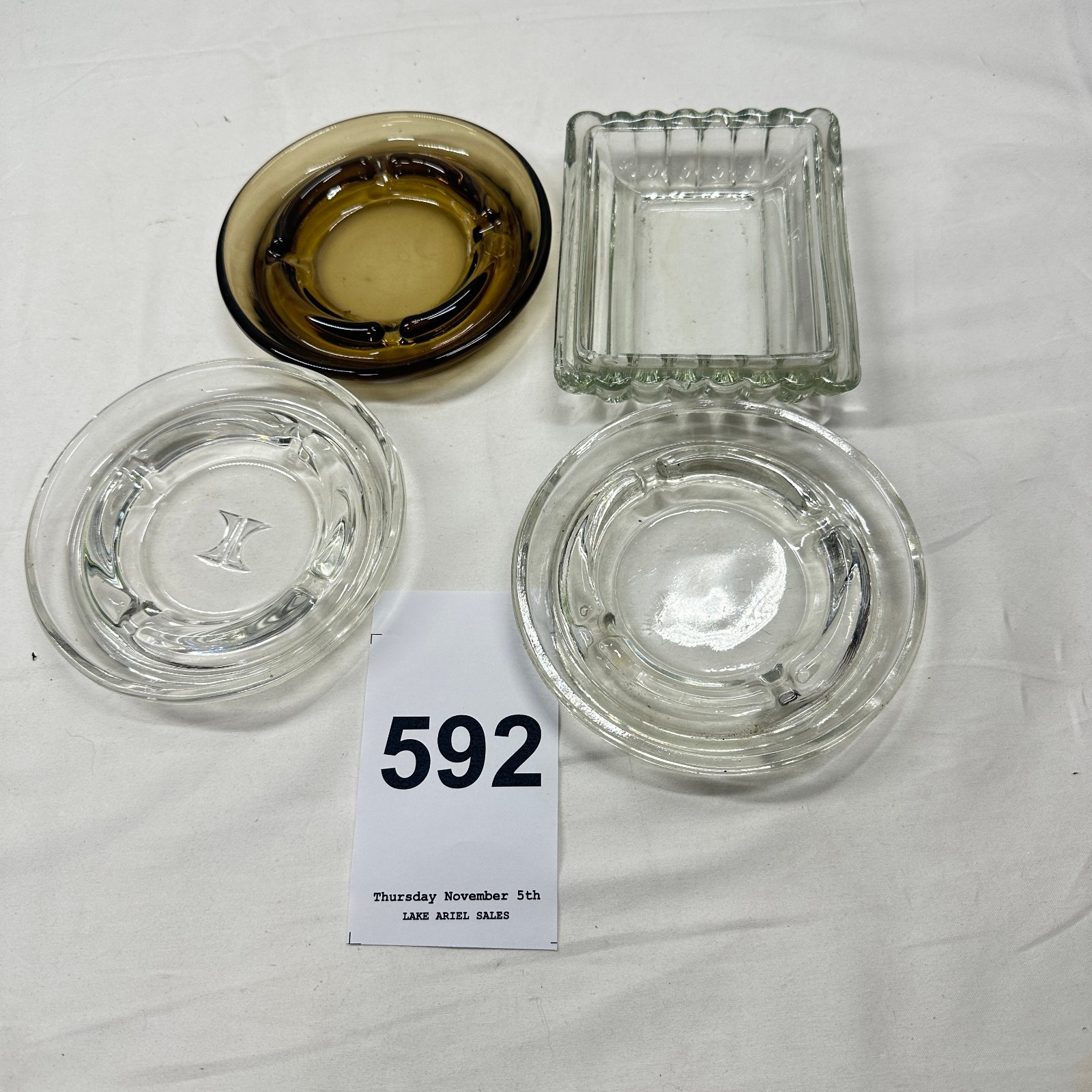 Lot 592: Mid-century glass ashtray set, 5 pieces including amber glass dish and monogrammed "K" ashtray