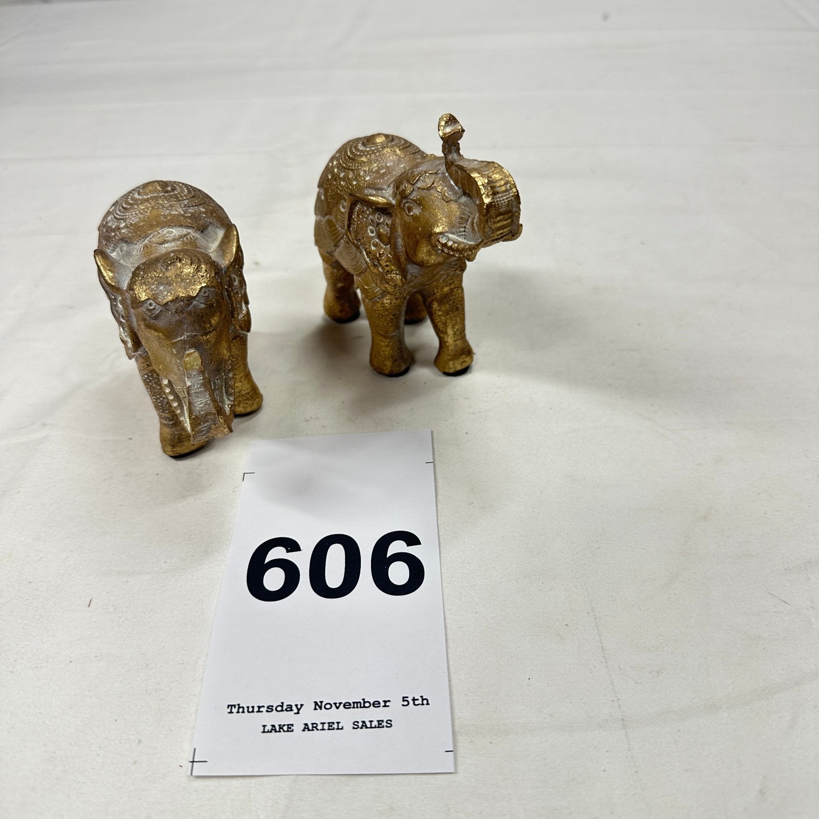 Lot 606: Gilt Indian-style elephant figurines, decorative jeweled mosaic design, set of 2