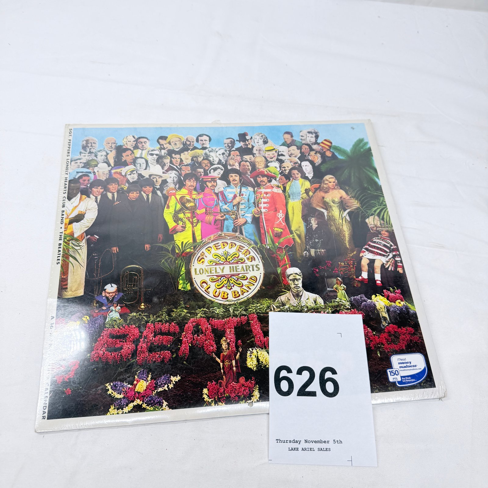 Lot 626: 2009 Mead "Sgt. Pepper's Lonely Hearts Club Band" The Beatles wall calendar, sealed, Apple Corps licensed