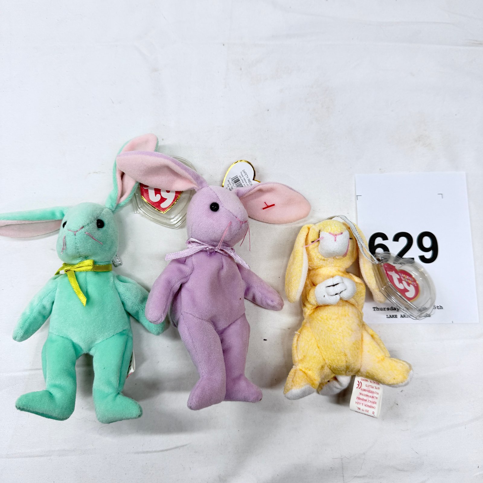 Lot 629: 1999-2001 Ty Beanie Babies bunny trio: "Hippity" (mint green), "Floppity" (lavender), and yellow bunny with tags