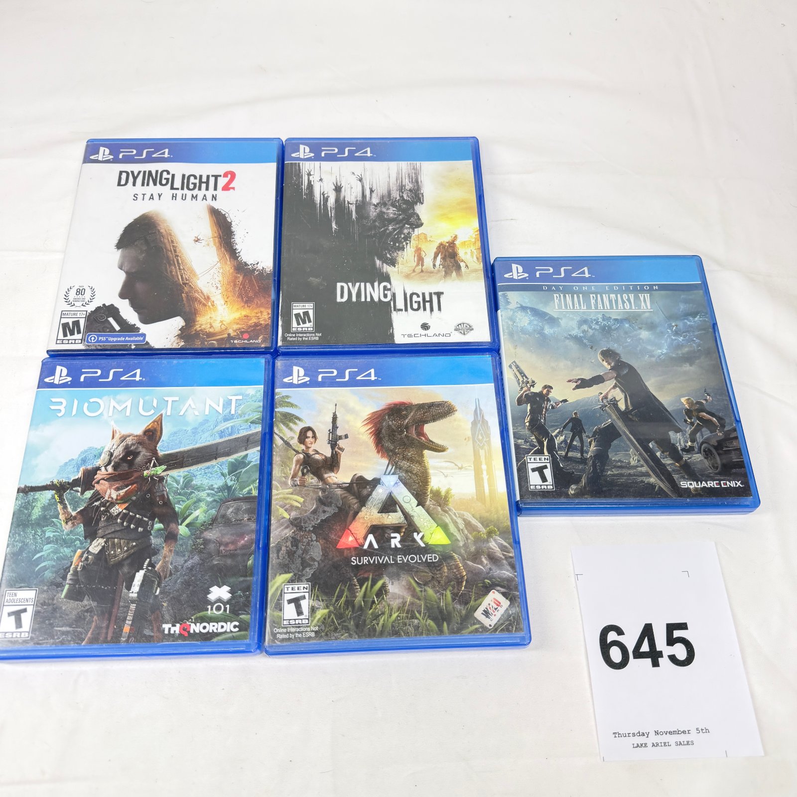 Lot 645: PS4 game lot (5): Dying Light 2 Stay Human, Dying Light, Biomutant, ARK Survival Evolved, Final Fantasy XV Day One Edition