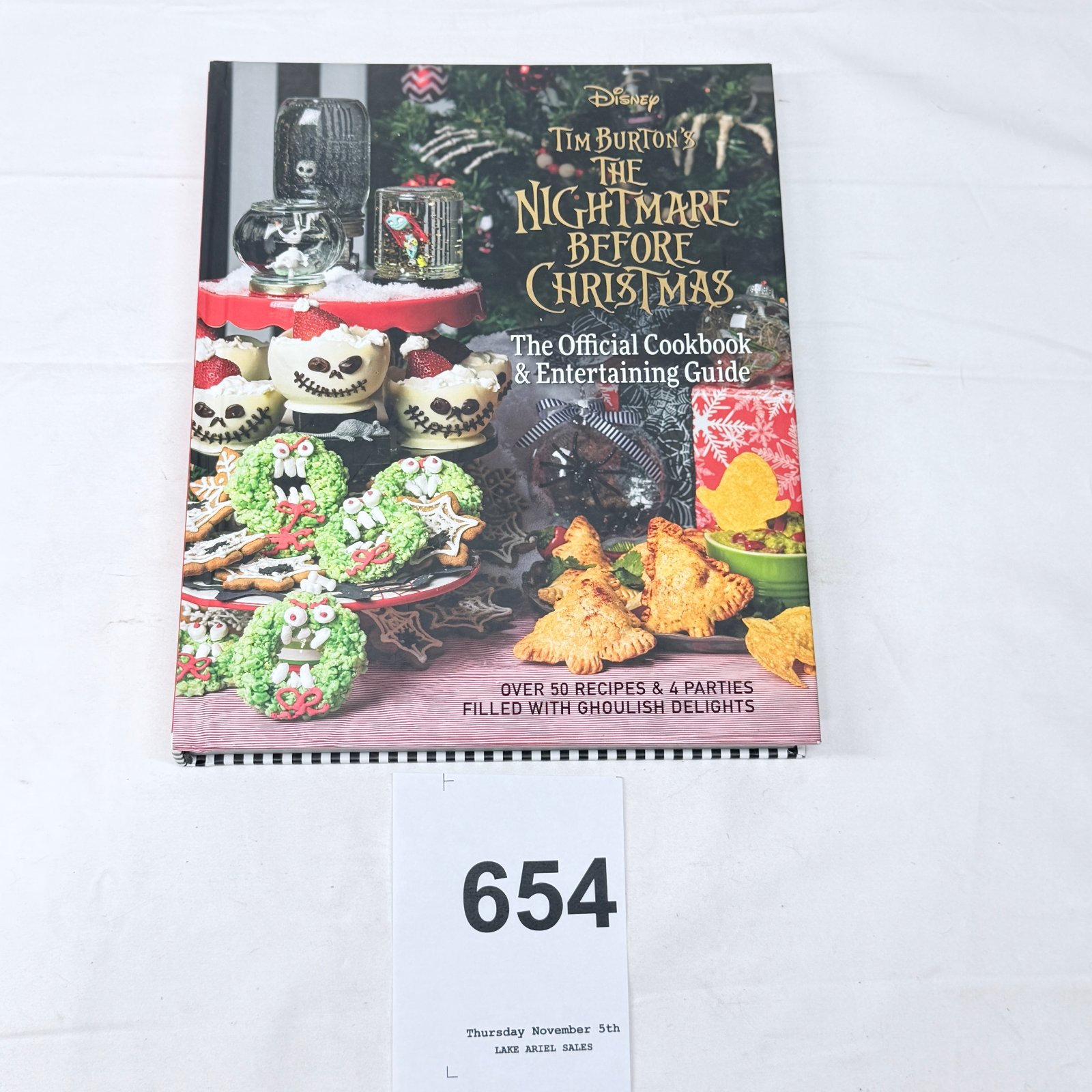Lot 654: Disney Tim Burton's The Nightmare Before Christmas: The Official Cookbook & Entertaining Guide, hardcover