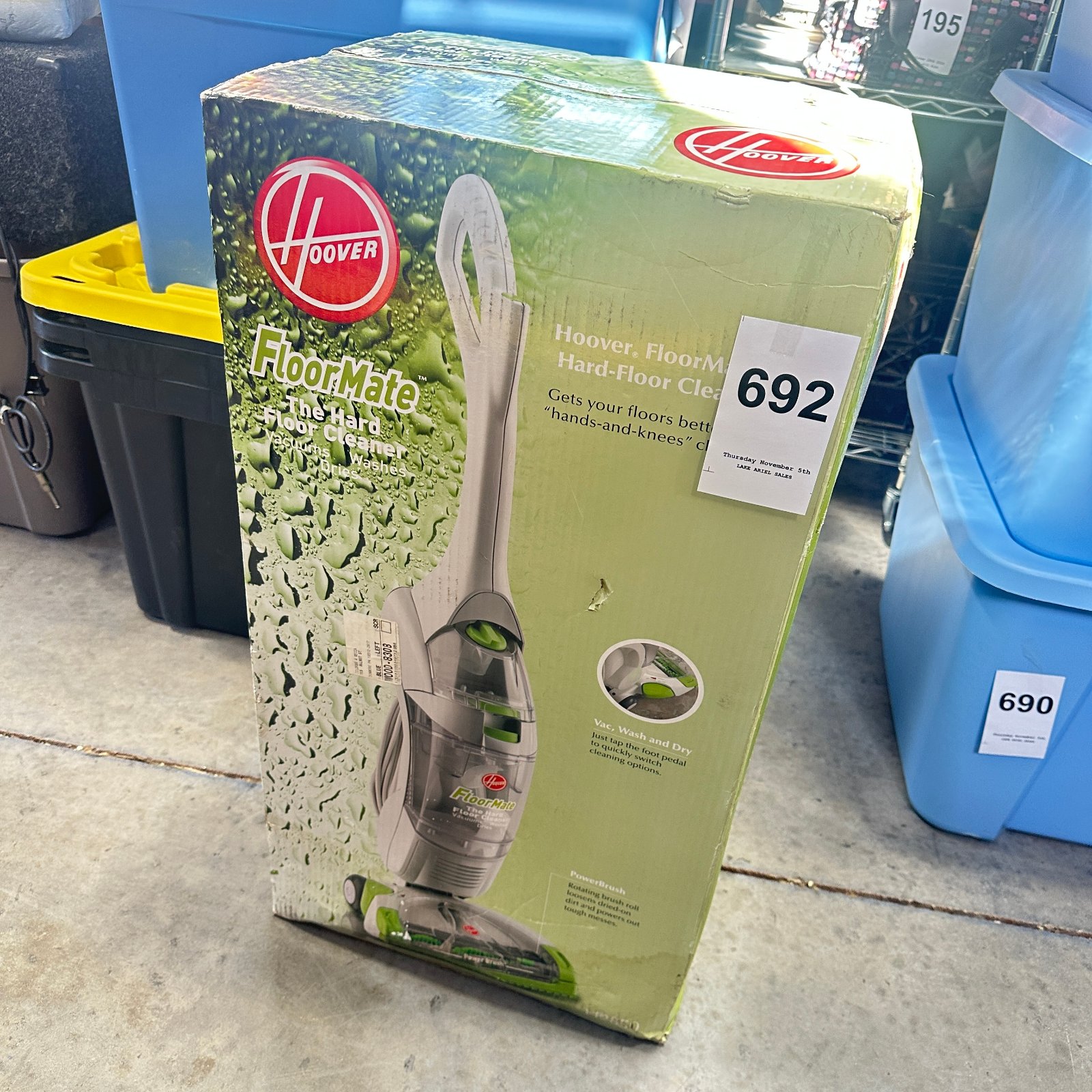 Lot 692: Hoover FloorMate "The Hard Floor Cleaner" vacuum, model 1000-8303, Vac Wash and Dry NEW Box Damage