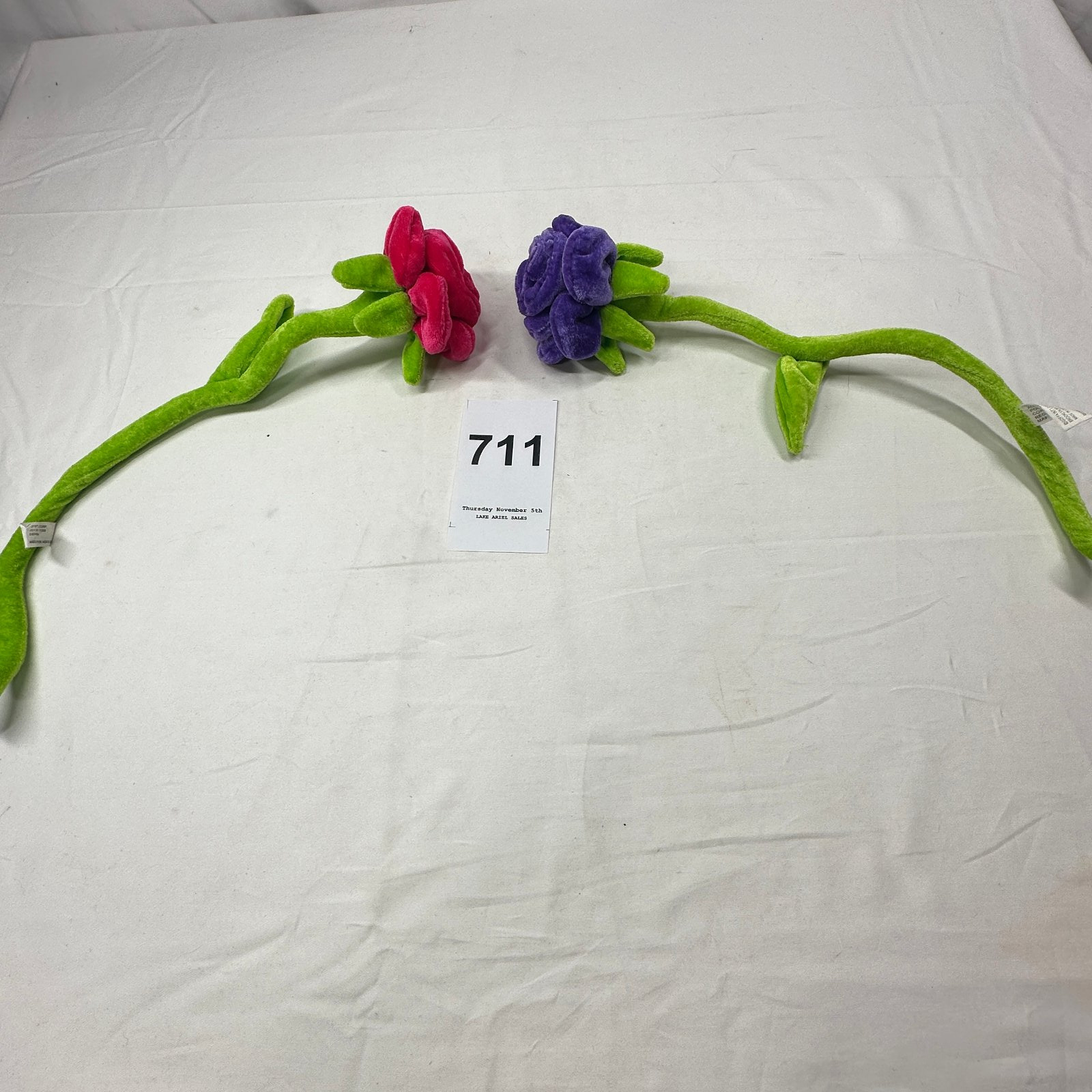 Lot 711: Goffa International plush velvet rose vine, red and purple flowers with curling green stem