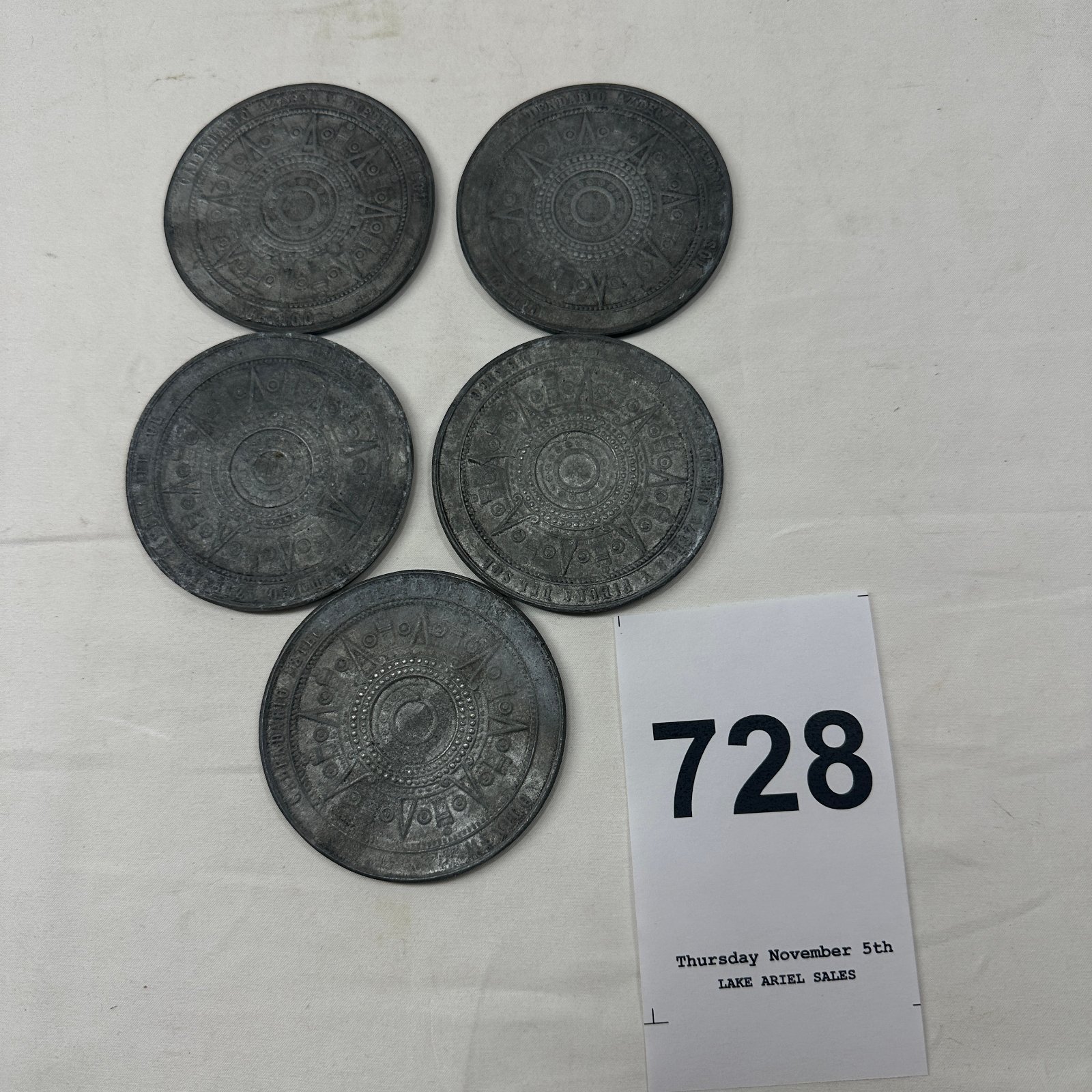 Lot 728: Mexican "Calendario Azteca" Aztec Sun Stone souvenir medallions, cast metal, set of 5