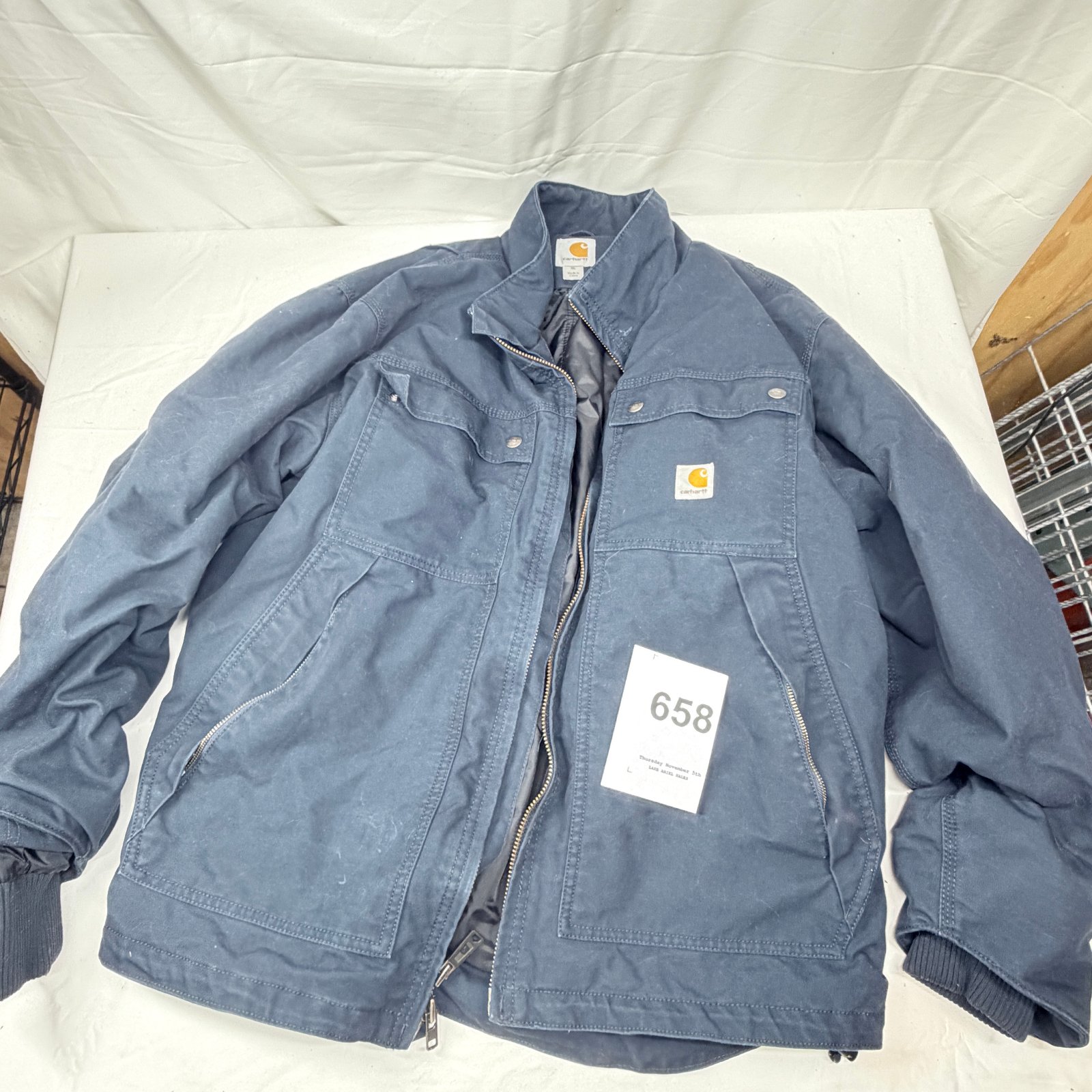 Lot 658: Carhartt men's XL Navy zip-front work jacket, 3M Thinsulate insulated lined, Made in China