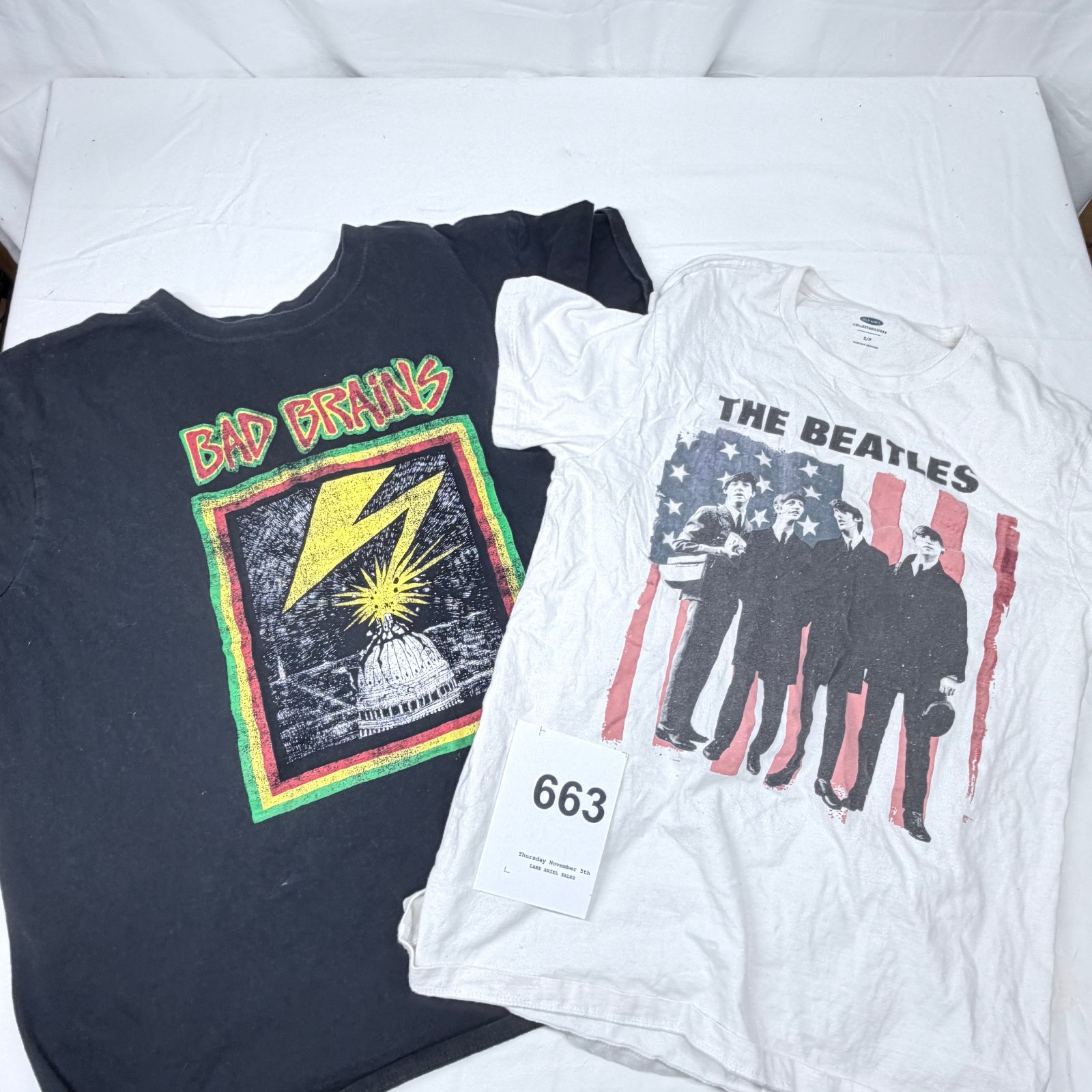 Lot 663: Bad Brains "Capitol" band T-shirt, black, paired with Old Navy Collectabilitees The Beatles graphic tee, size S