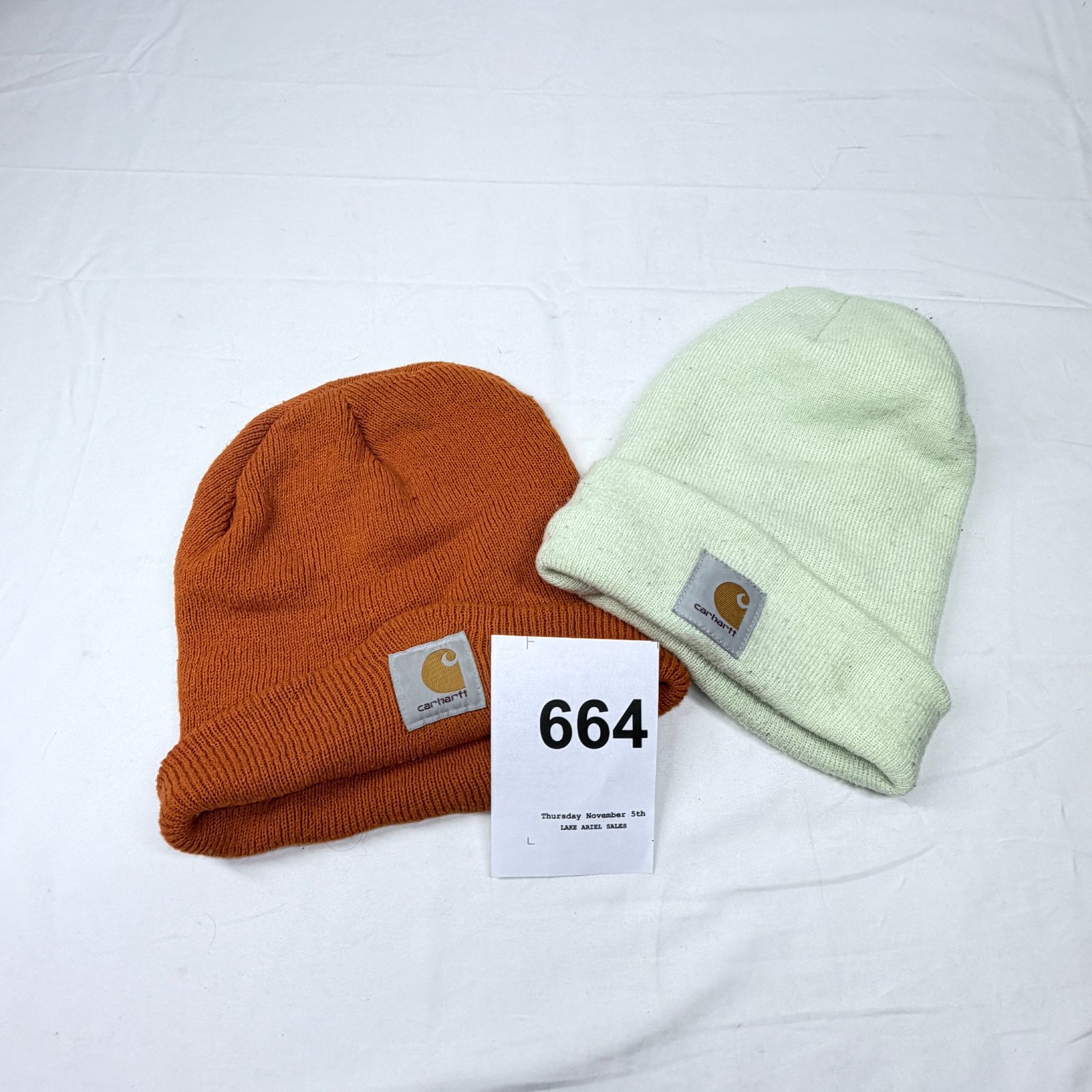 Lot 664: Carhartt Acrylic Watch Hat Cuffed Beanies, set of 2 (orange and mint green)