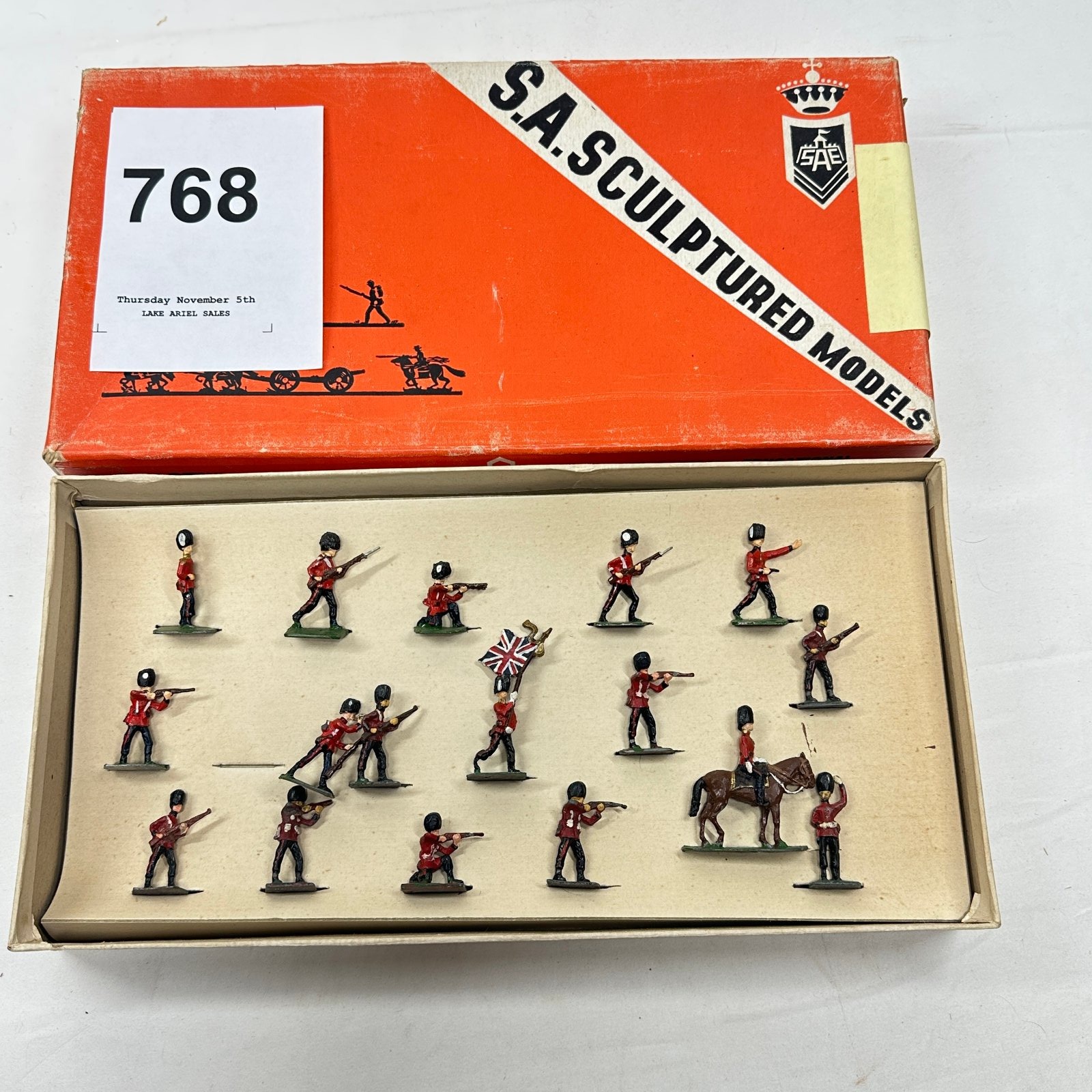 Lot 768: S.A. Sculptured Models British Infantry regiment flat figures with mounted officer and flag bearer, boxed set of 16