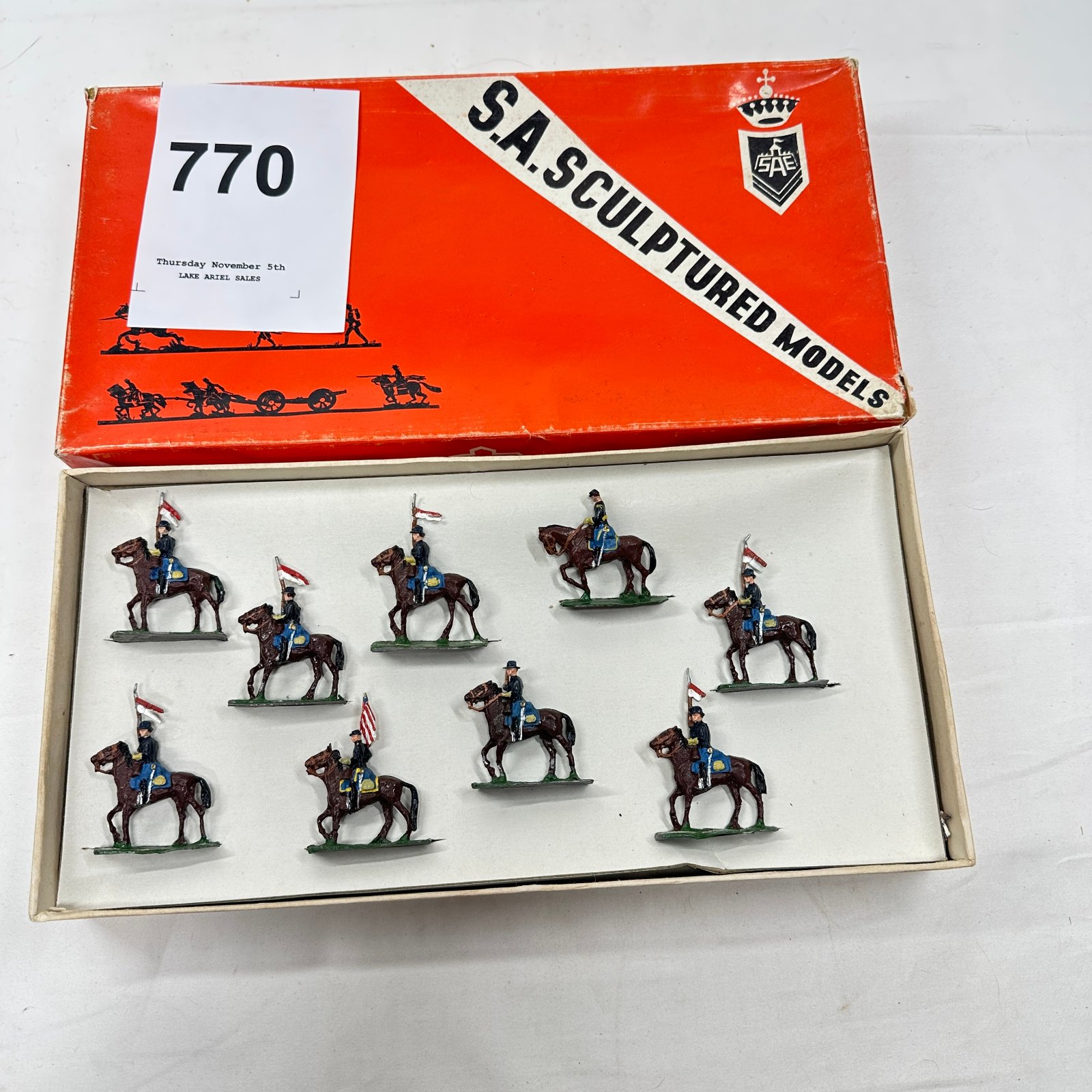 Lot 770: S.A. Sculptured Models "SAE" US Cavalry mounted figures (some with flags), 9-piece boxed set, American Civil War Union figures