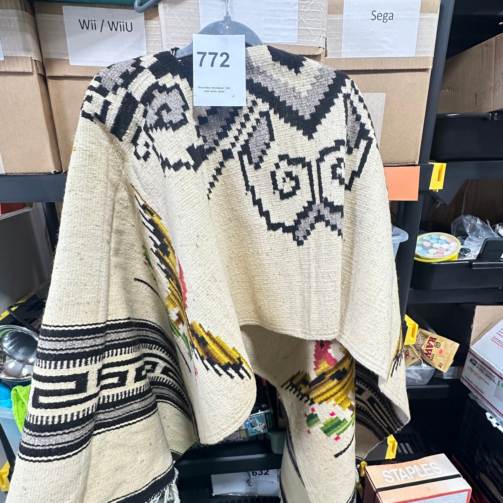 Lot 772: Handwoven Mexican wool poncho, geometric Aztec diamond design with cactus and bird motifs