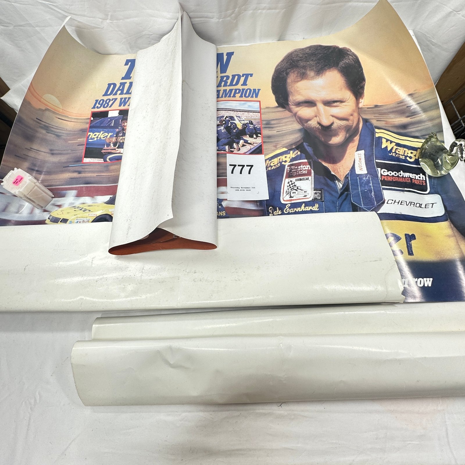 Lot 777: 1987-2003 NASCAR Dale Earnhardt "Top Gun" Wrangler Chevrolet Winston Cup Champion posters, lot of 2