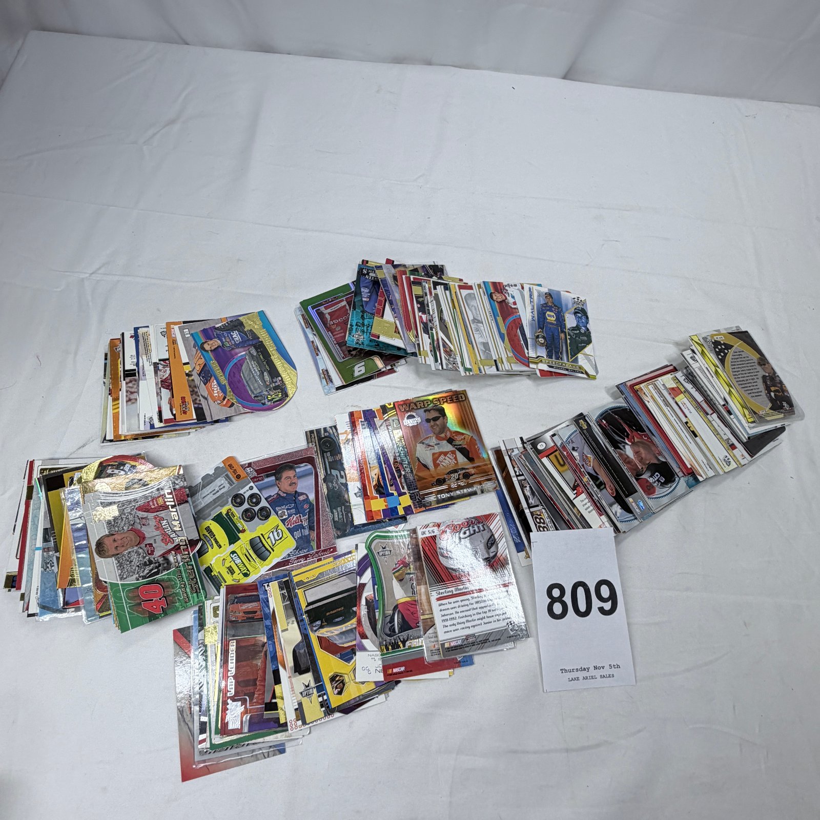 Lot 809: NASCAR racing trading card lot, 1990s-2000s, mixed brands incl. Press Pass, Upper Deck, Wheels, Optima, 300+ cards featuring Stewart, Marlin, Labonte