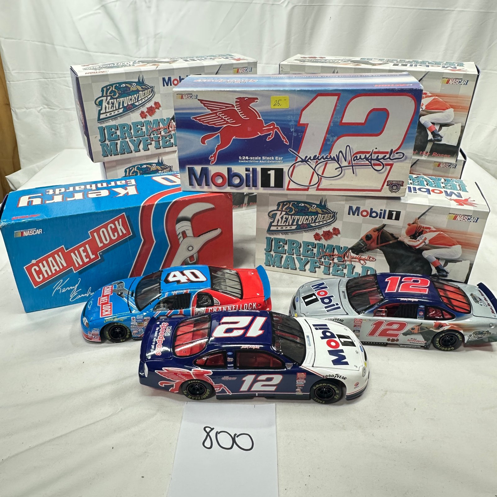 Lot 800: 1999 Action NASCAR 1:24 diecast lot: Jeremy Mayfield #12 Mobil 1 Kentucky Derby & Kerry Earnhardt #40 Channellock stock cars