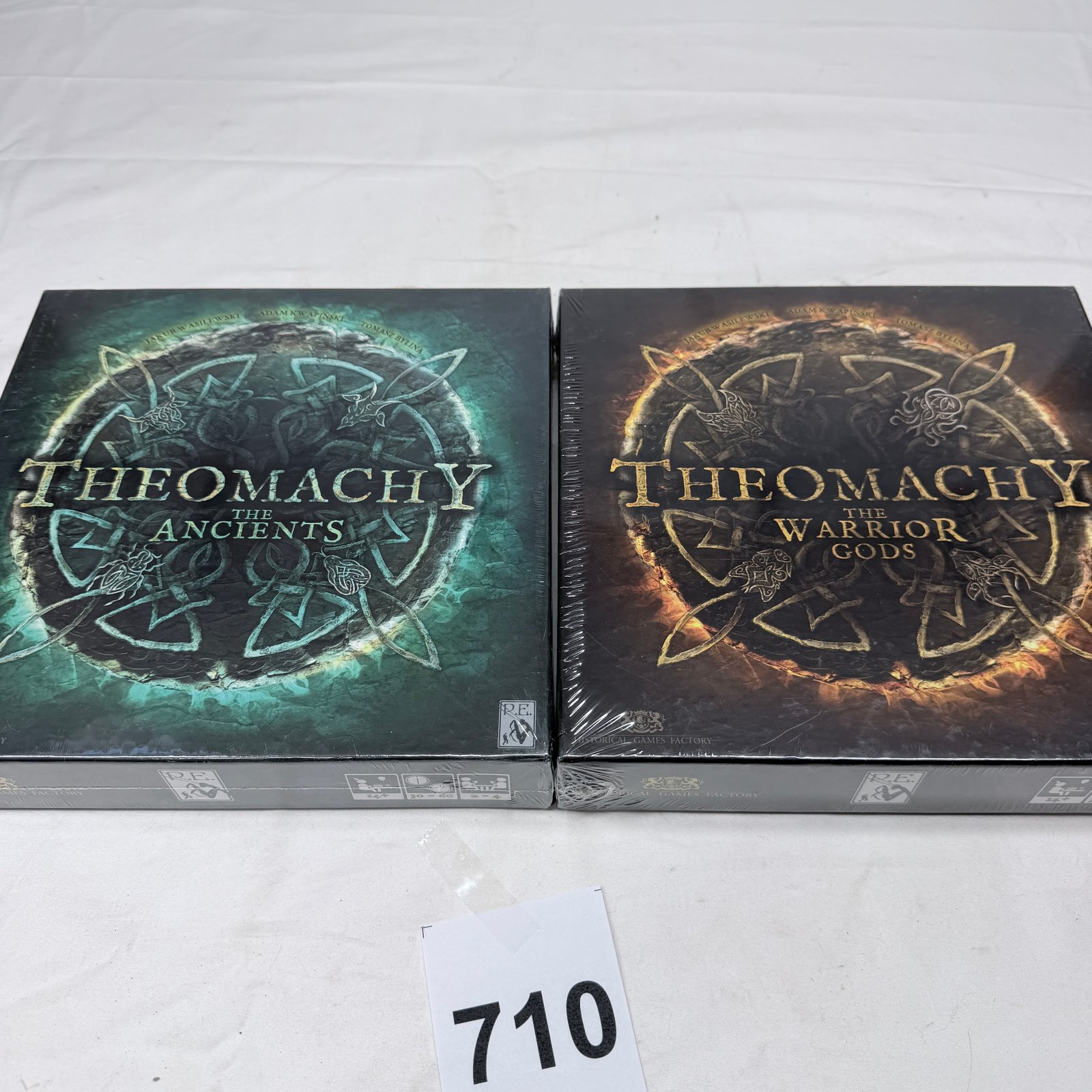 Lot 710: Theomachy "The Warrior Gods" & "The Ancients" board games, by Jakub Wasilewski/Adam Kwapiński/Tomasz Bylina, sealed set of 2