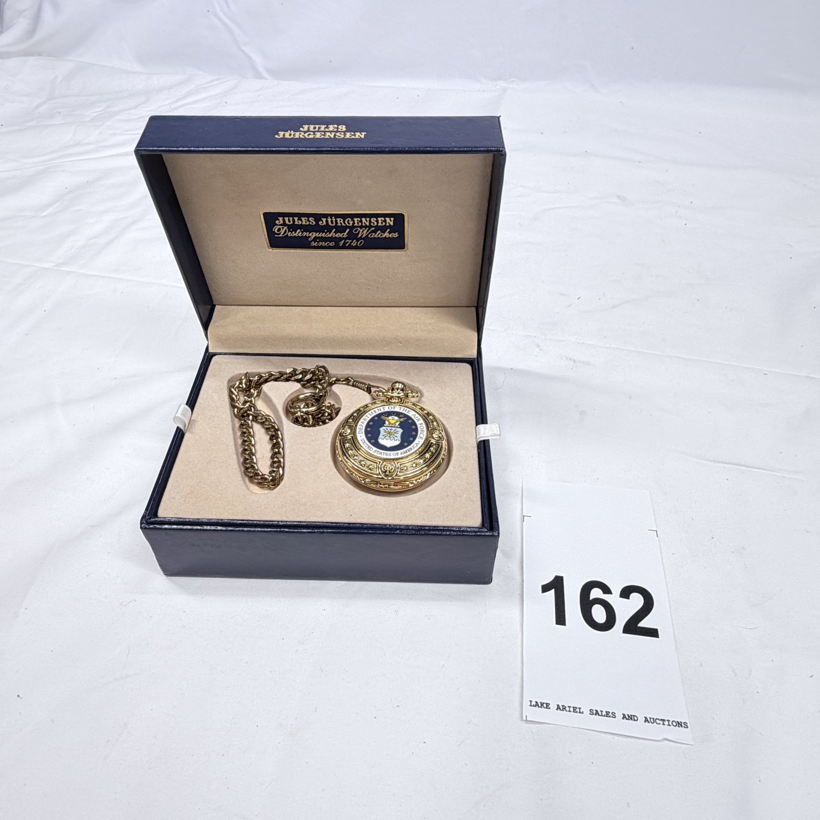 Lot 162: Jules Jürgensen Department of the Air Force gold-tone pocket watch with chain, original box and papers