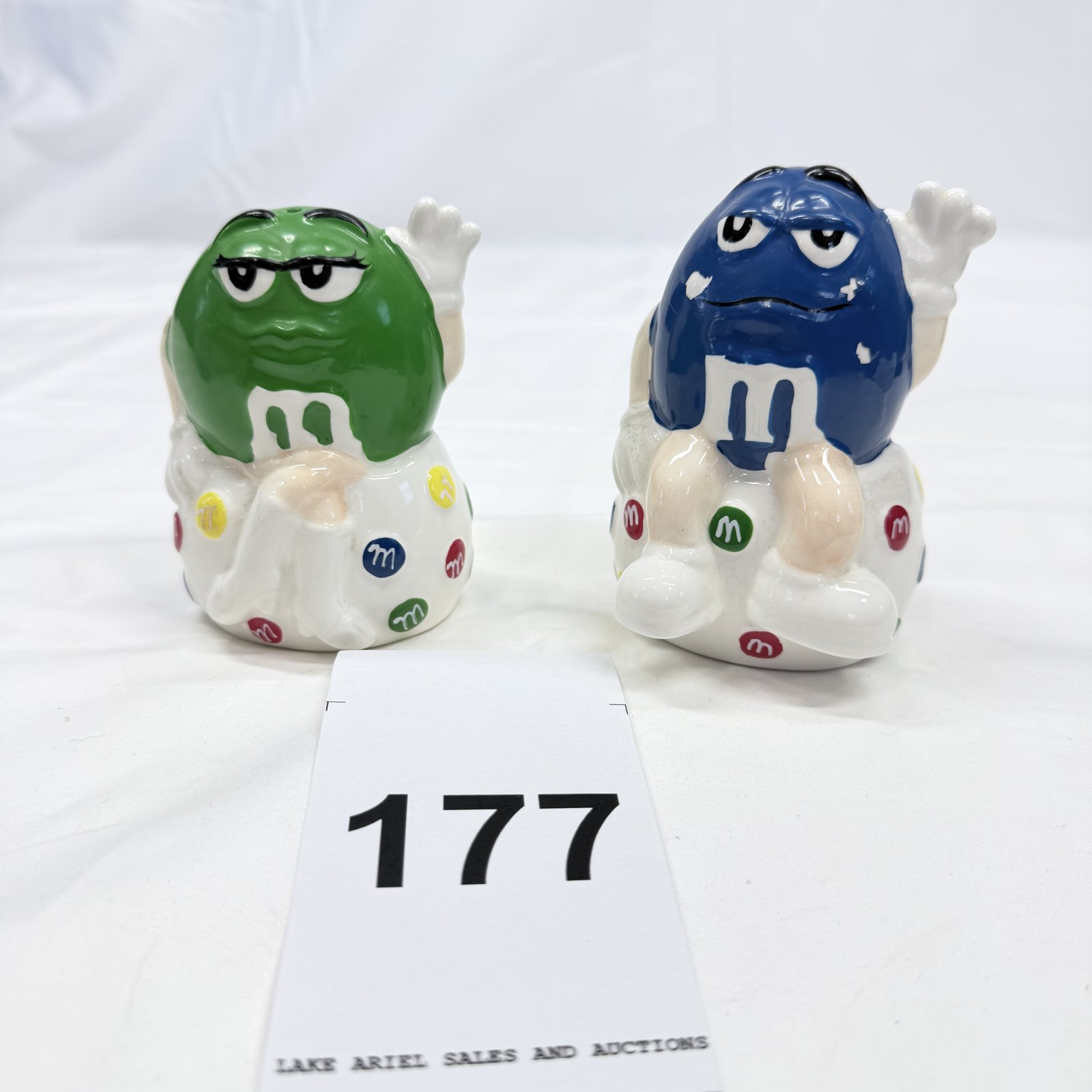 Lot 177: Mars/Lipper International M&M's Green & Blue character ceramic salt and pepper shakers, Made in China