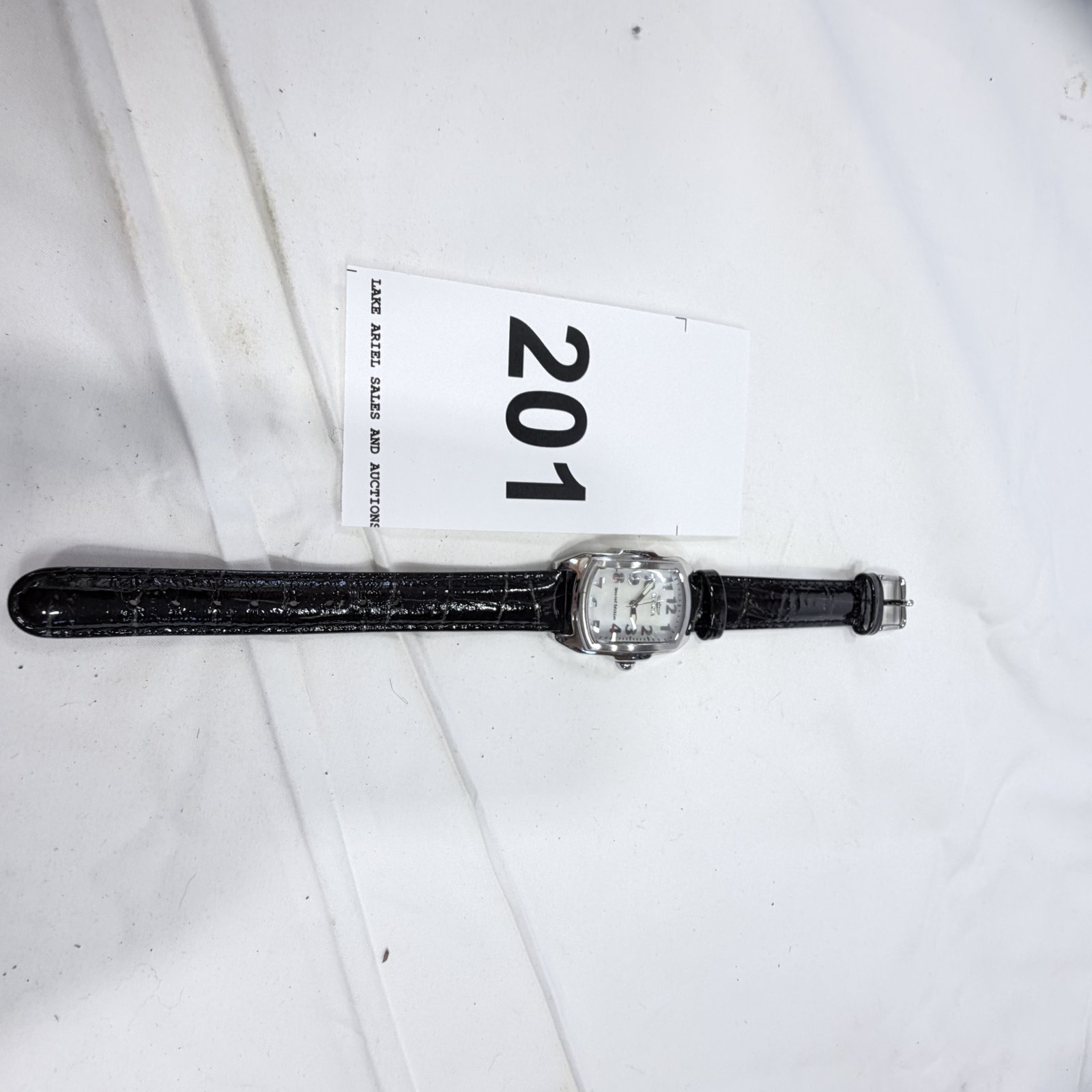 Lot 201: Invicta Lupah Special Edition women's watch, Model No. 5168, TRITNITE night glow, mother-of-pearl dial, leather band