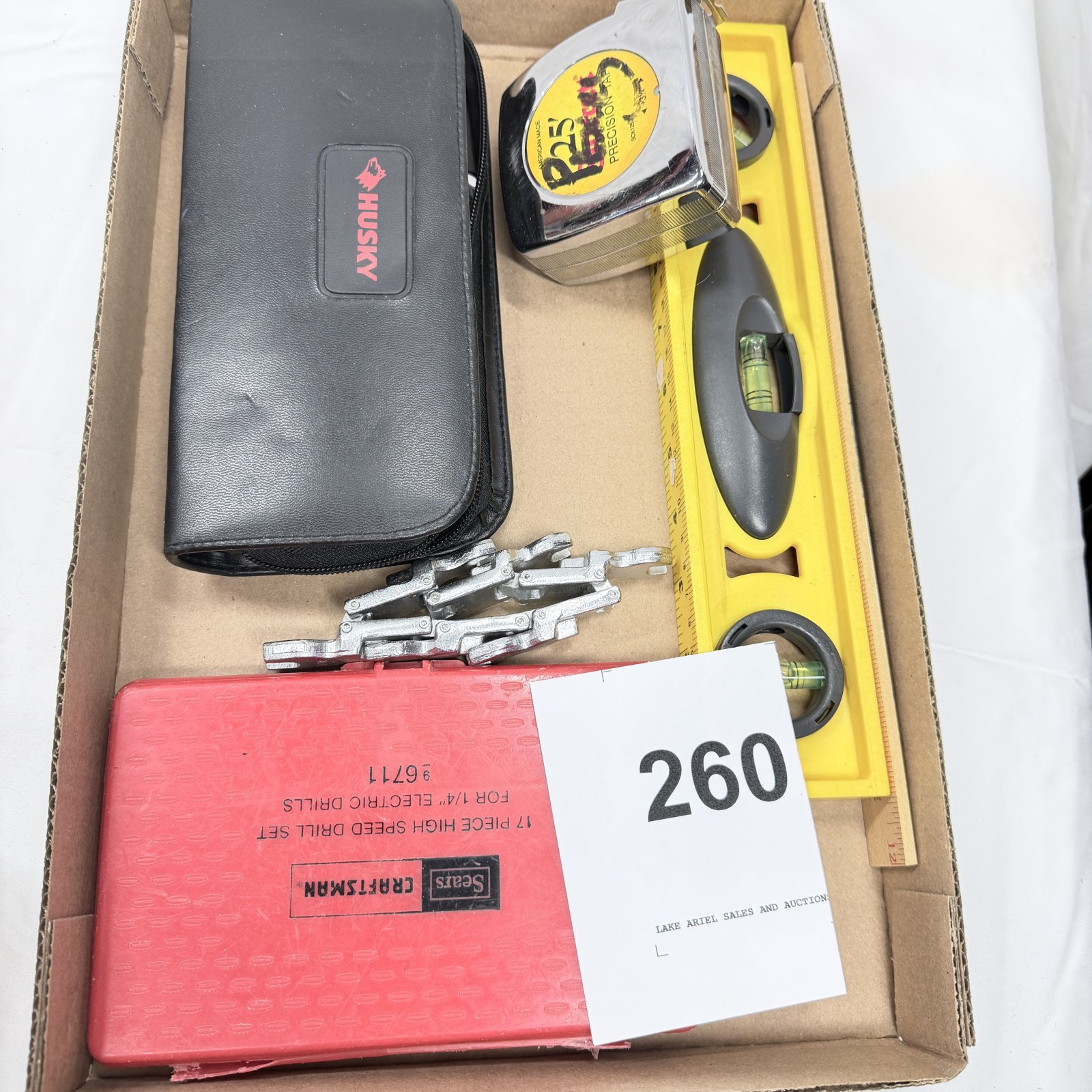 Lot 260: Craftsman 17-piece high speed drill bit set with Husky pouch, Sears socket set, torpedo level & tape measure lot