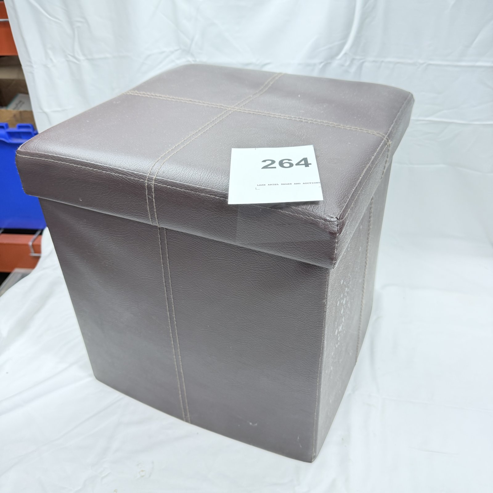 Lot 264: Faux leather folding storage ottoman cube with stitched lid