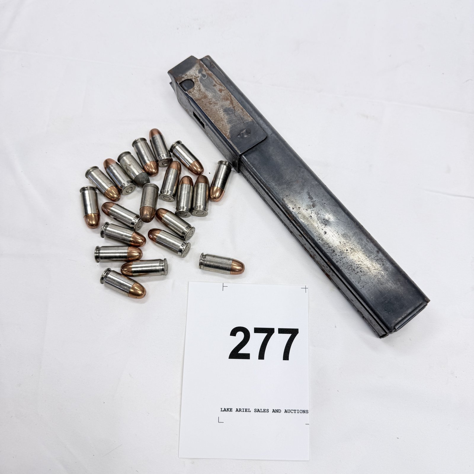 Lot 277: .45 ACP 32-round submachine gun magazine with 20 rounds of .45 Auto FMJ ammunition