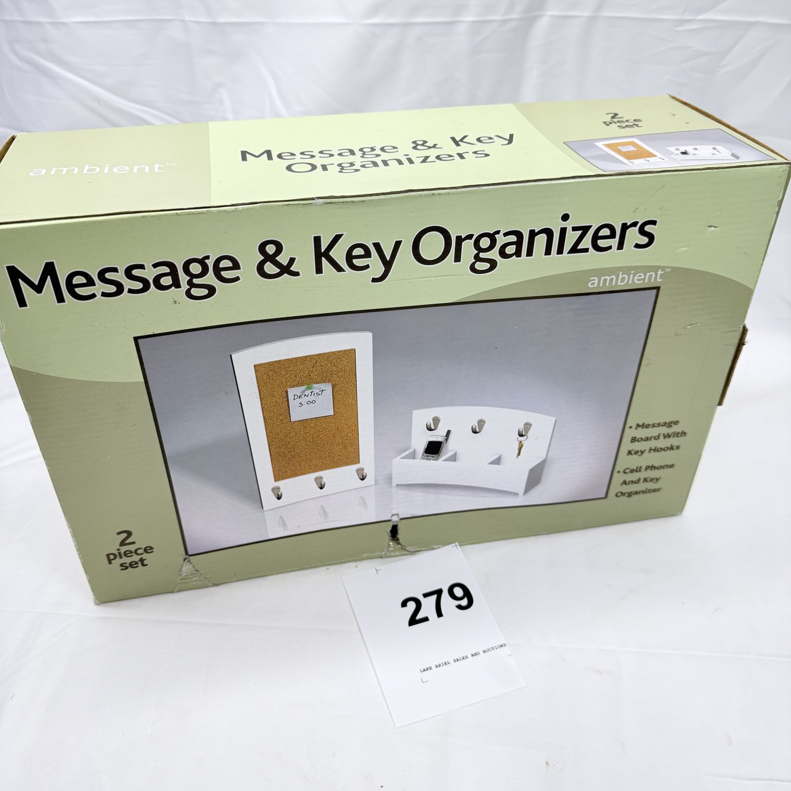 Lot 279: Ambient Message & Key Organizers 2-piece set, corkboard message board with key hooks and cell phone/key organizer tray