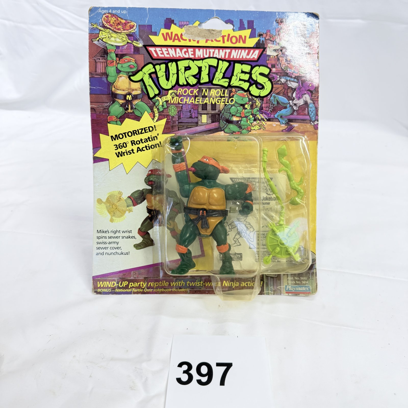 Lot 397: 1991 Playmates TMNT "Wacky Action Rock 'N Roll Michaelangelo" action figure, MOSC Asst. No. 5610