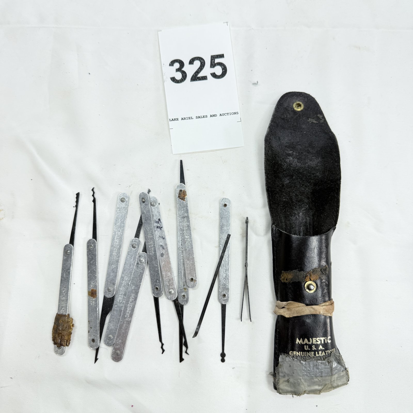Lot 325: Majestic USA lock pick and tension wrench set, genuine leather pouch case