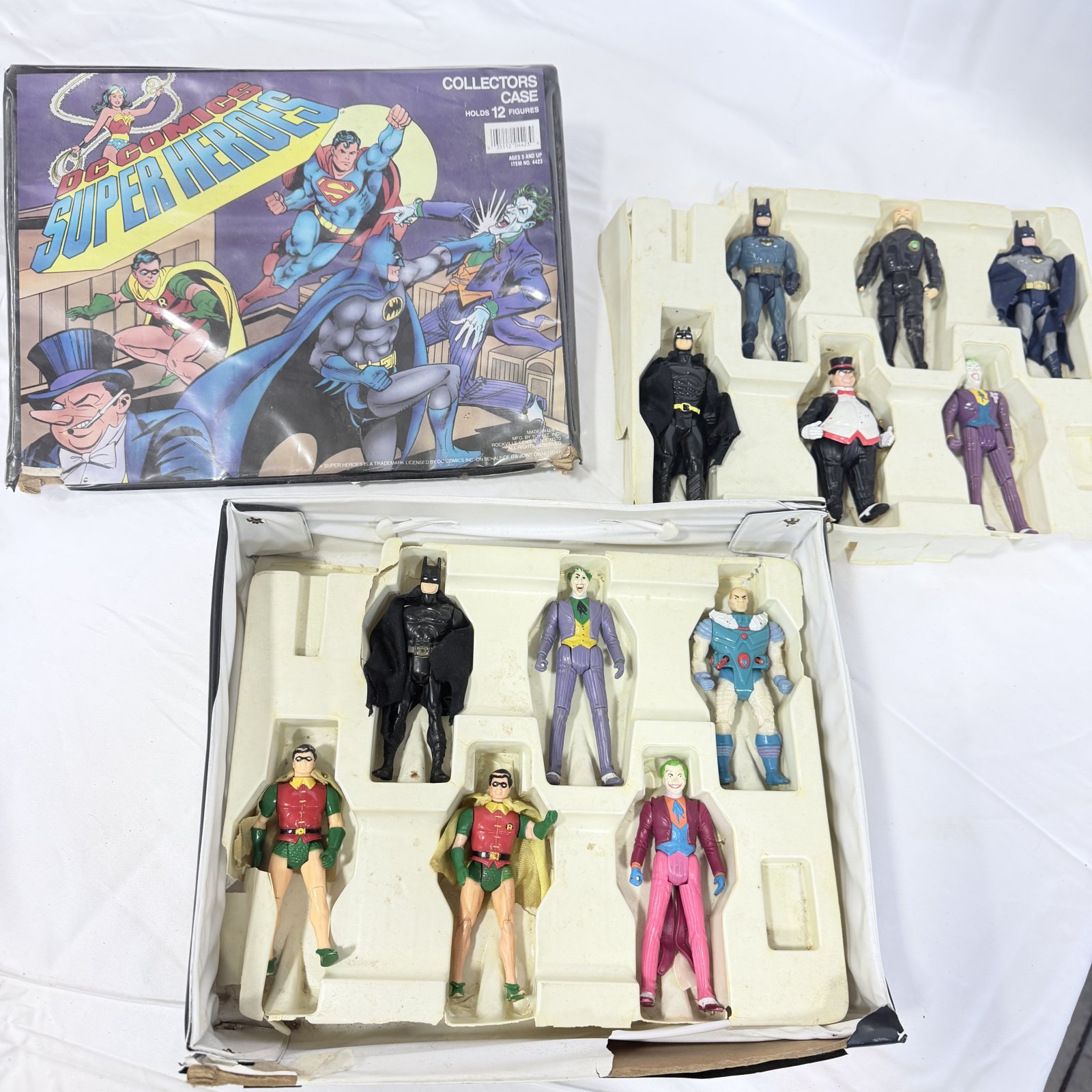 Lot 390: 1989-90s DC Comics Super Heroes Batman/Joker action figure lot with Collectors Case (holds 12 figures)