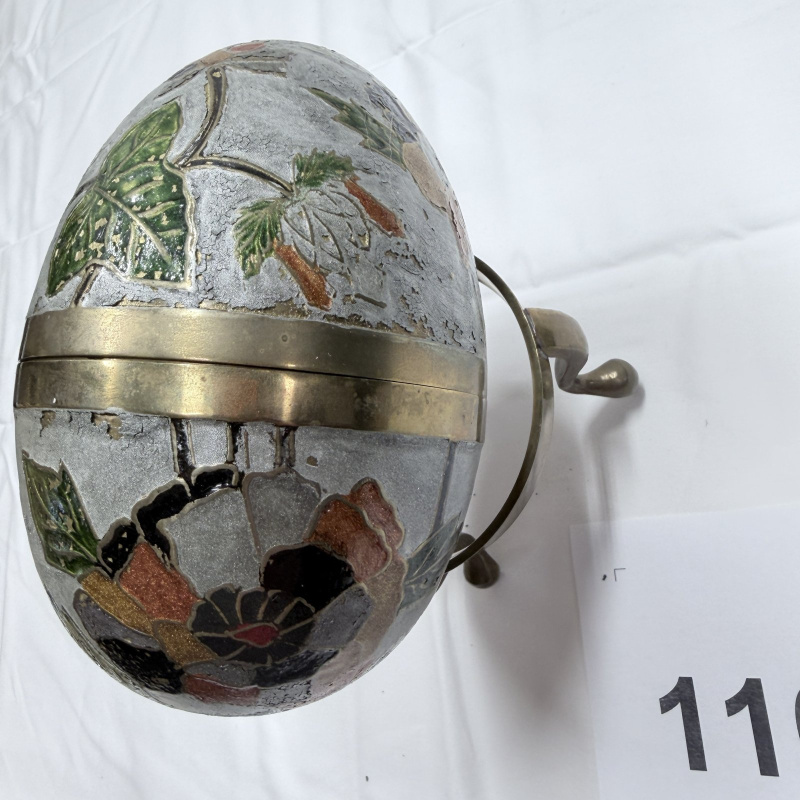 Lot 116: Decorative Metal Egg-Shaped Trinket Box with Floral Design and Brass Stand