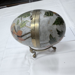 Lot 116: Decorative Metal Egg-Shaped Trinket Box with Floral Design and Brass Stand
