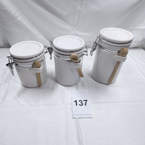 Lot 137: White Ceramic Canister Set of 3 with Wood Spoons and Wire Bail Lids