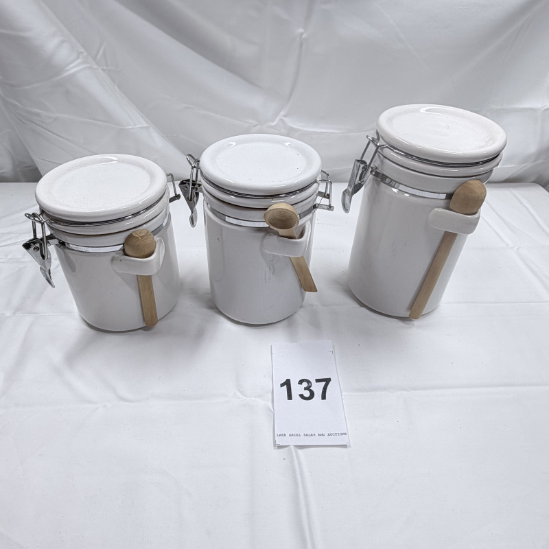 Lot 137: White Ceramic Canister Set of 3 with Wood Spoons and Wire Bail Lids