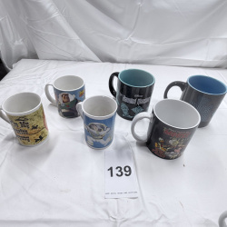 Lot 139: Lot of 6 Disney Theme Park Mugs - Toy Story, Haunted Mansion, Tomorrowland